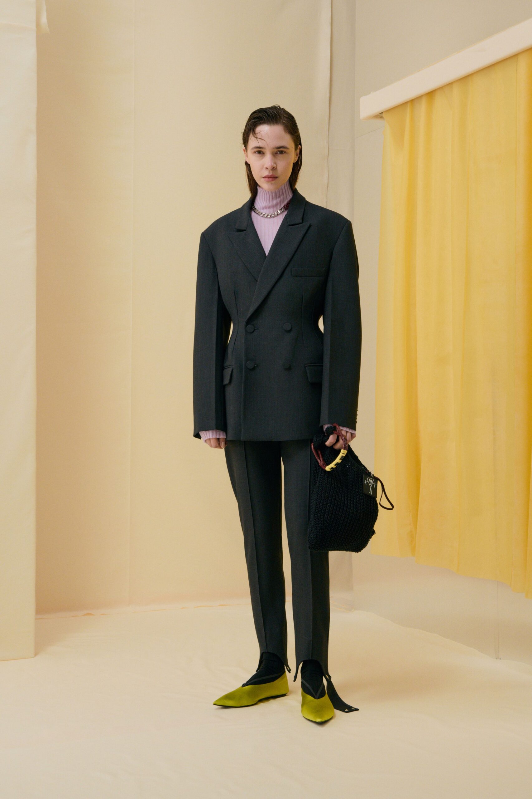 black tailored suit with pink top