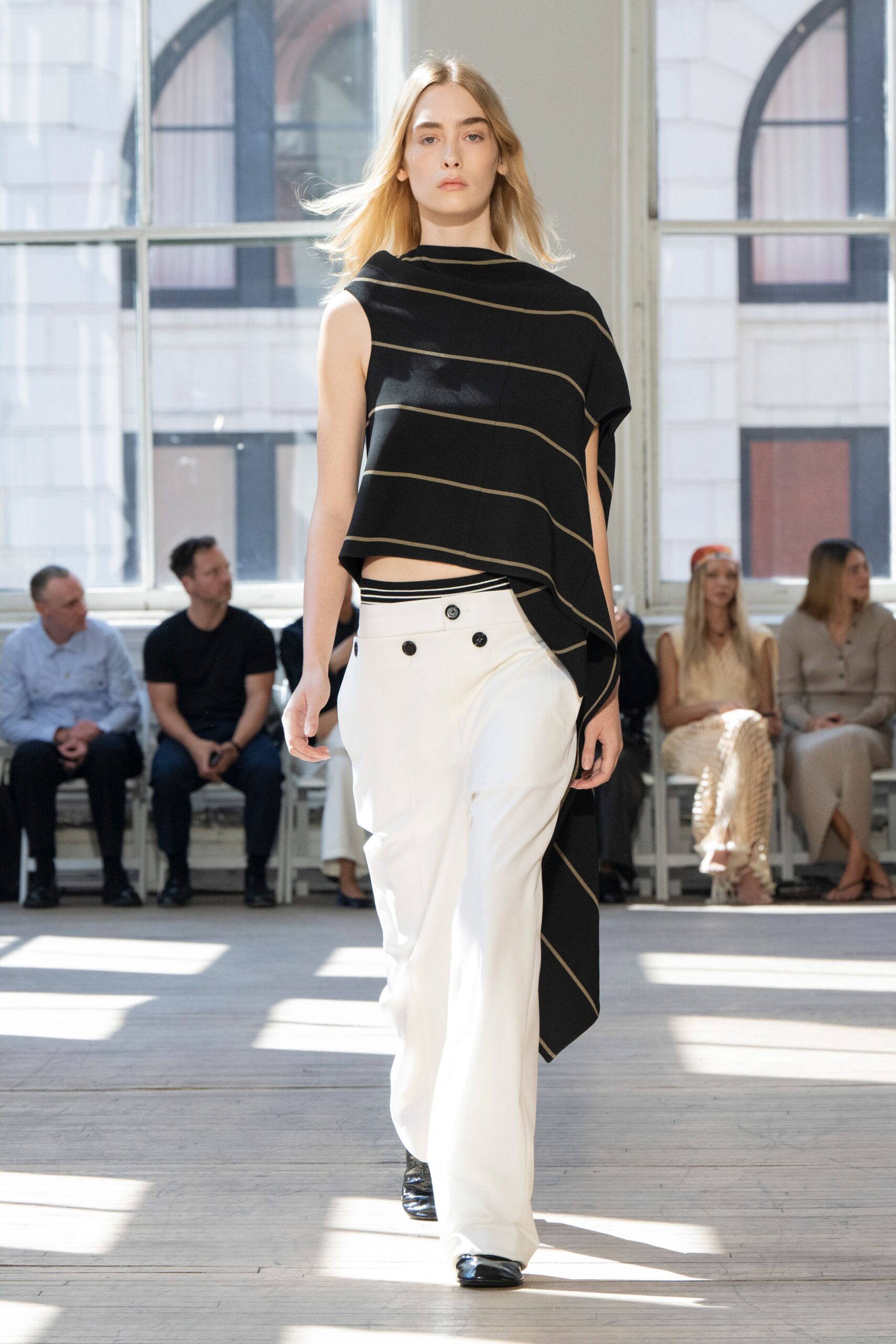black and white asymmetric top with relaxed pants