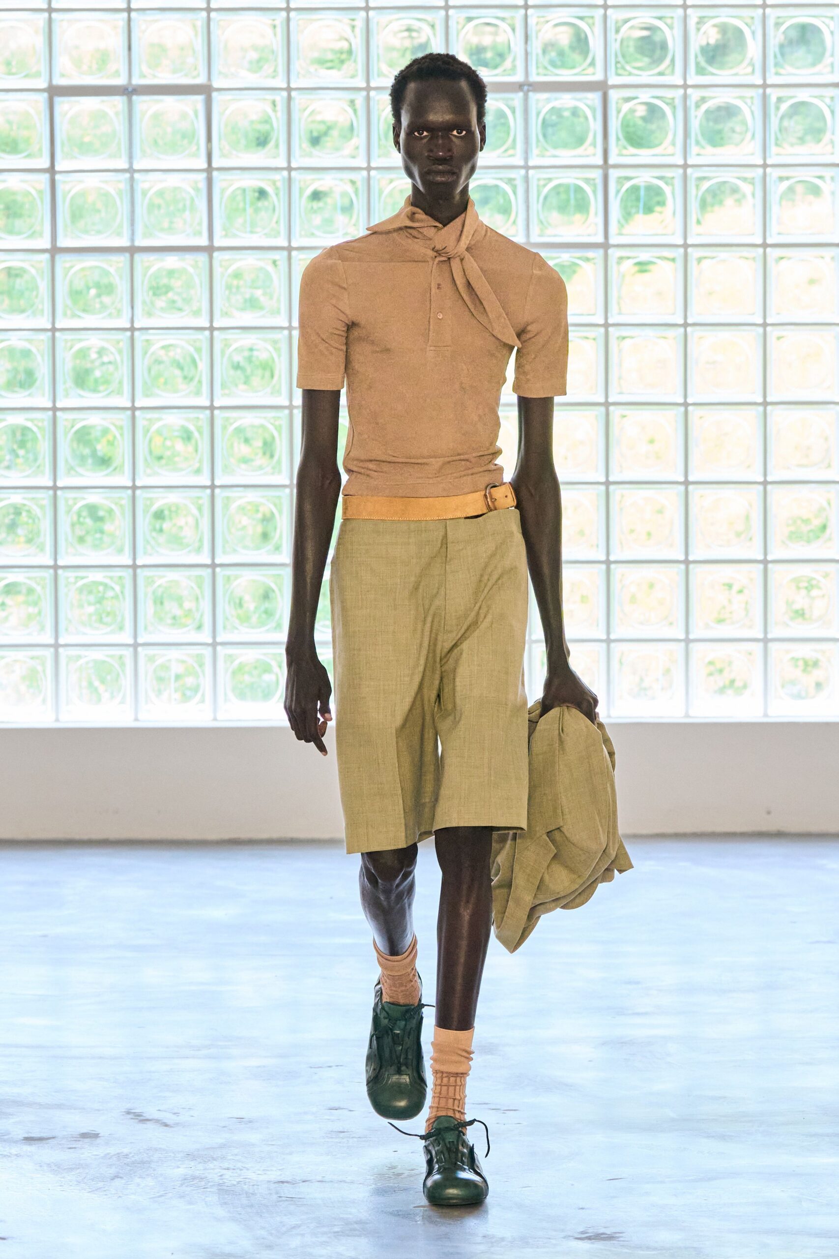 beige shirt green shorts outfit