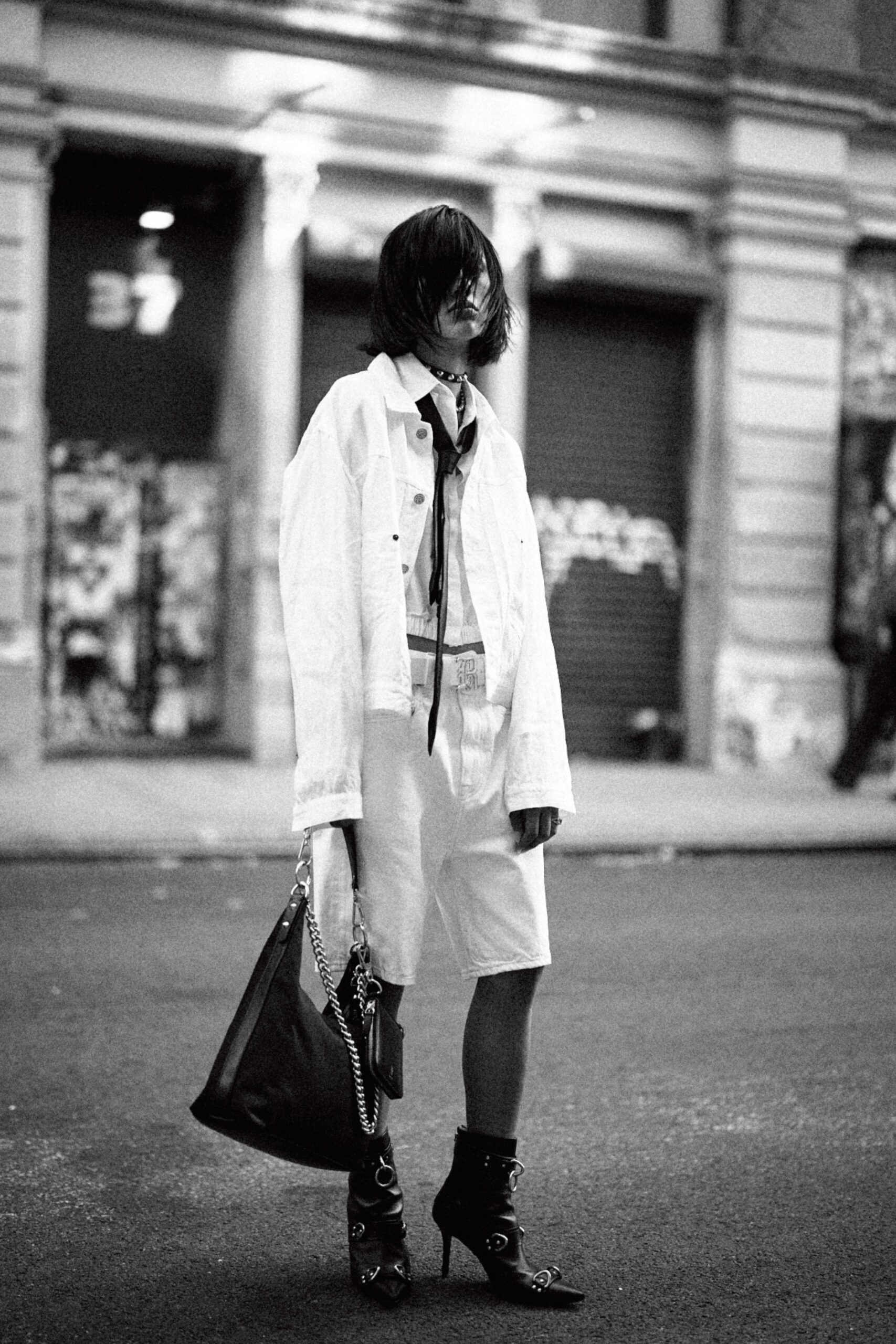 white denim long-sleeve collared oversized buttoned jacket