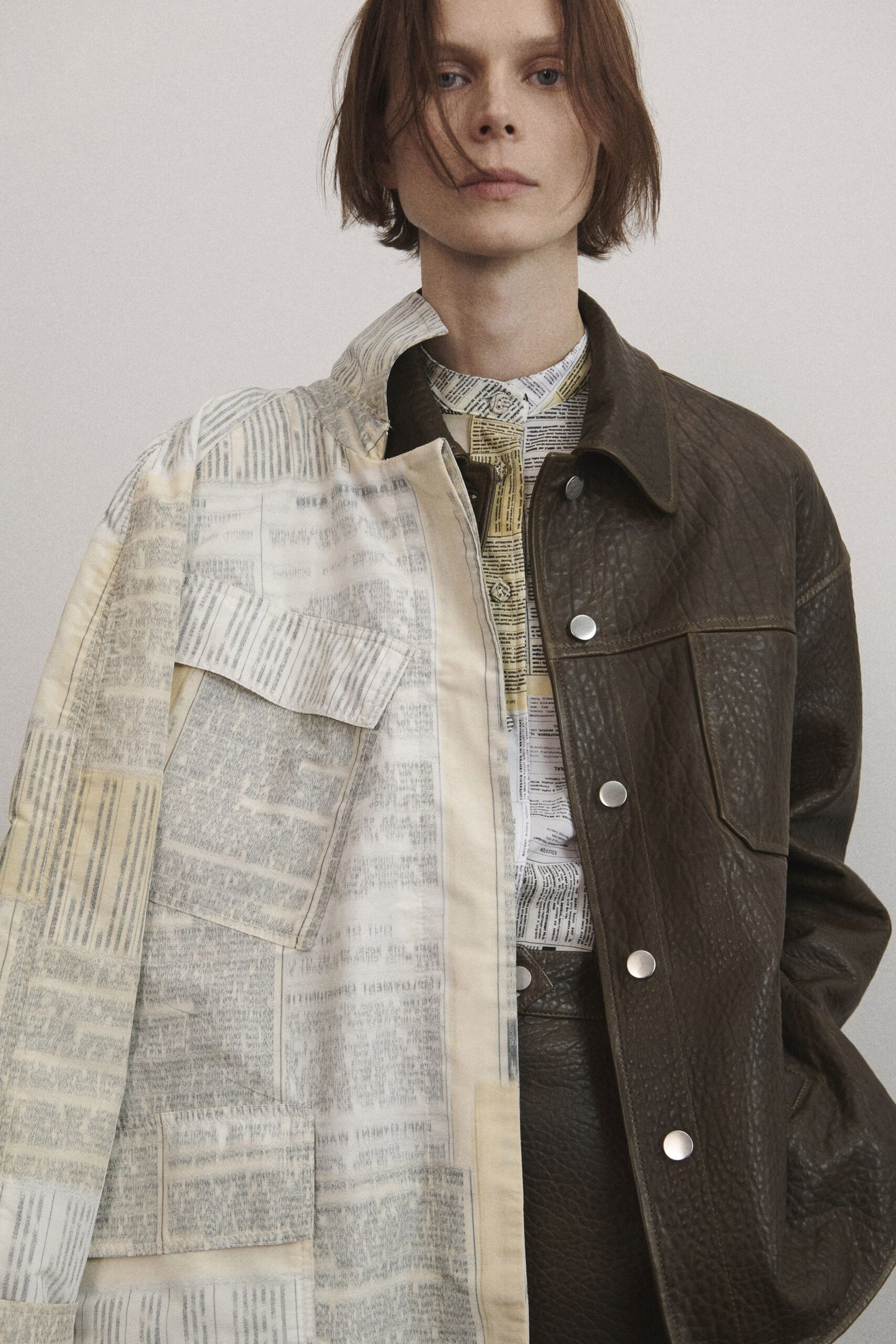 brown leather long-sleeve collared relaxed buttoned layered jacket