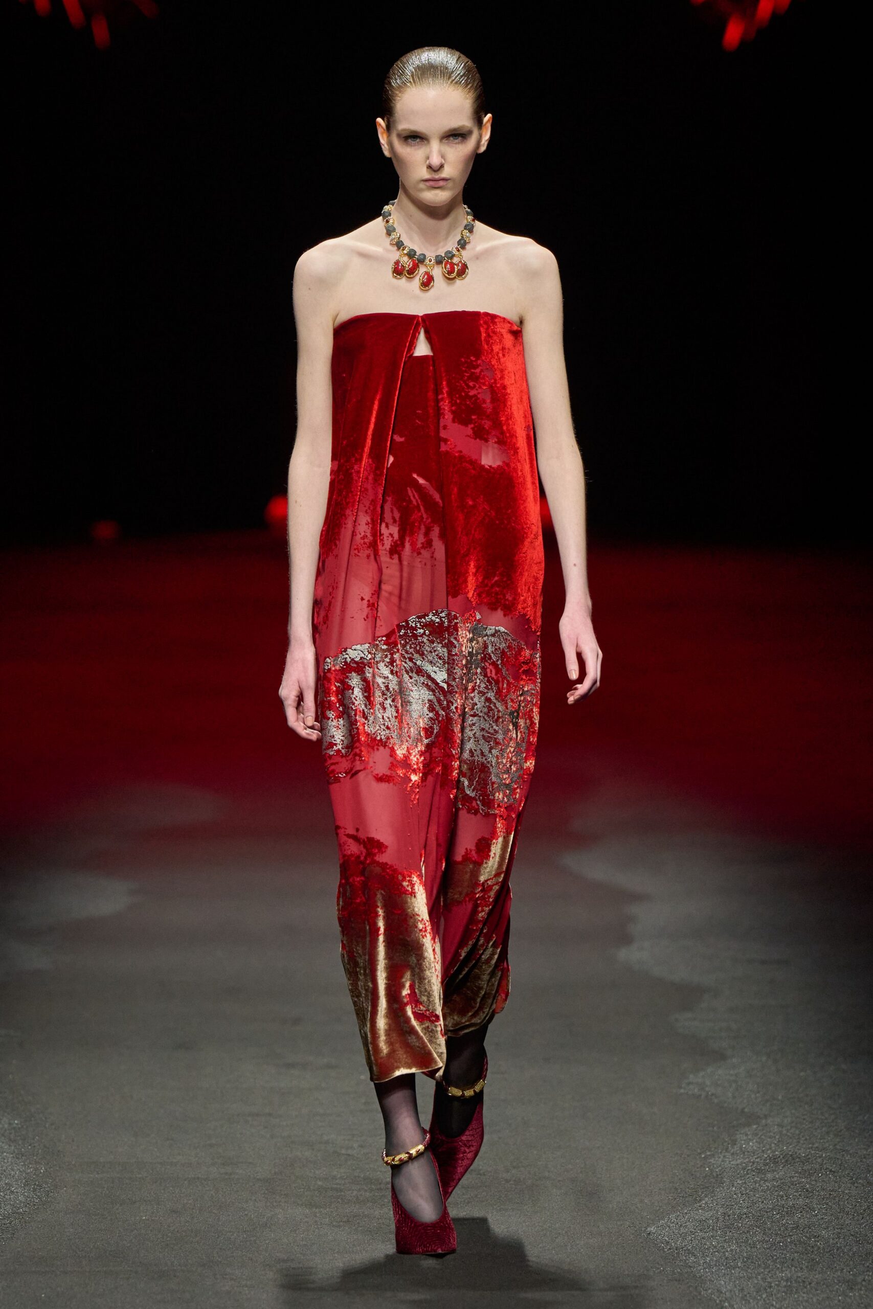 red silk strapless fitted embroidered draped shiny gown