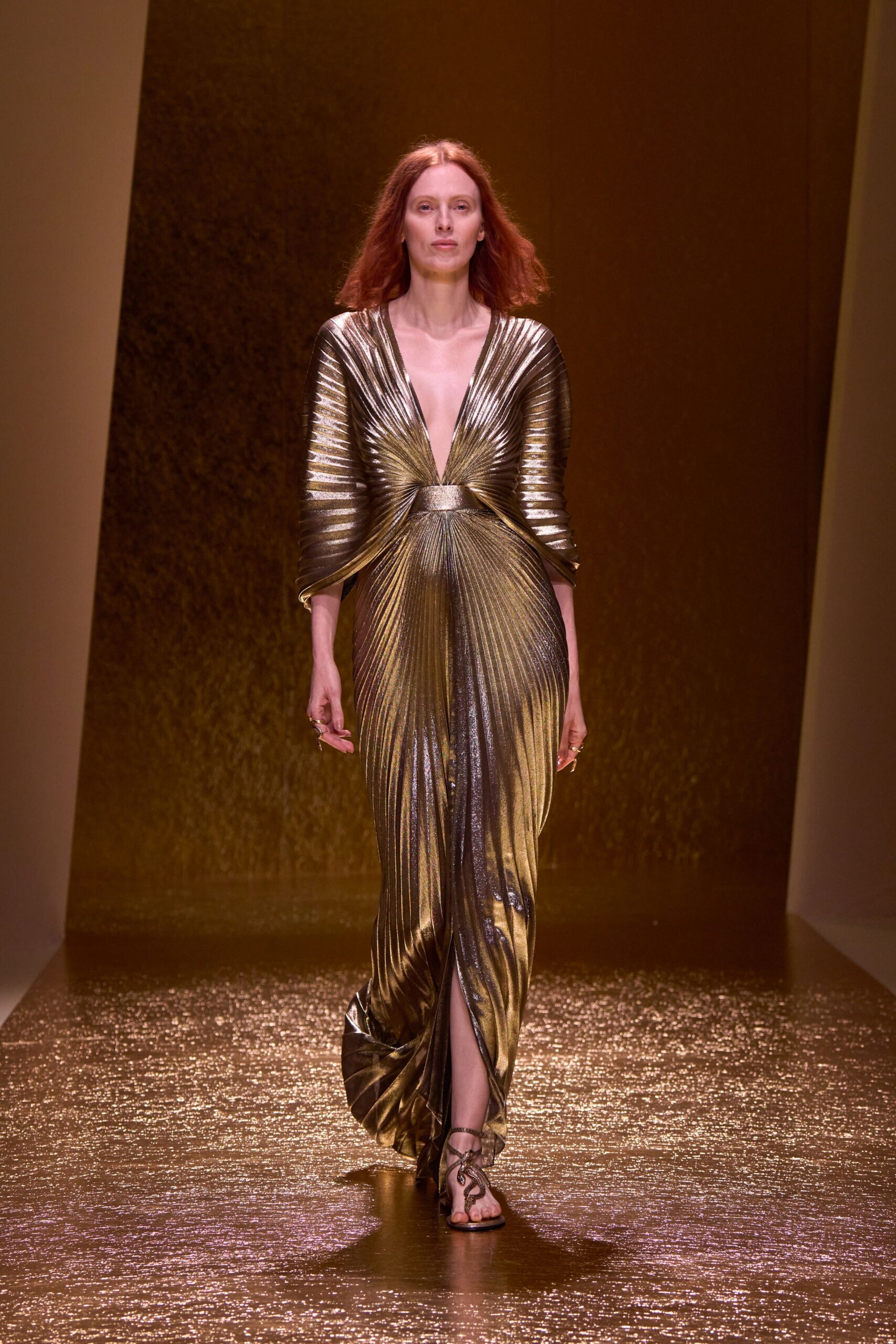 gold metallic long-sleeve v-neck fitted pleated shiny gown