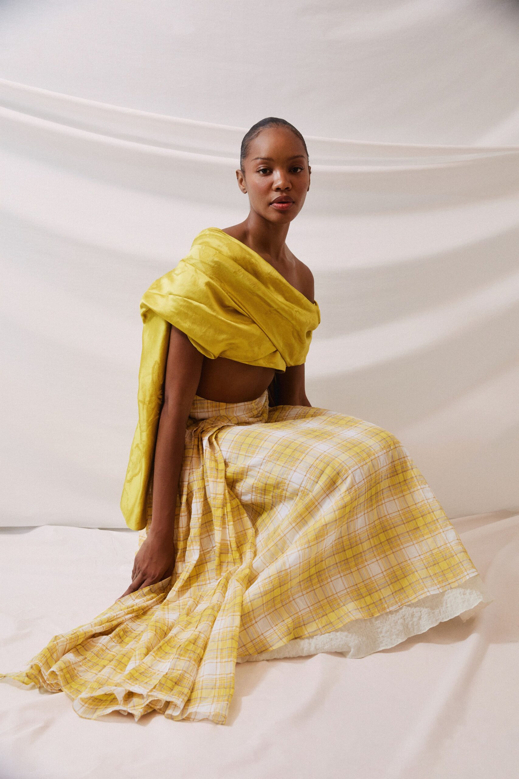 yellow silk sleeveless off-shoulder fitted top