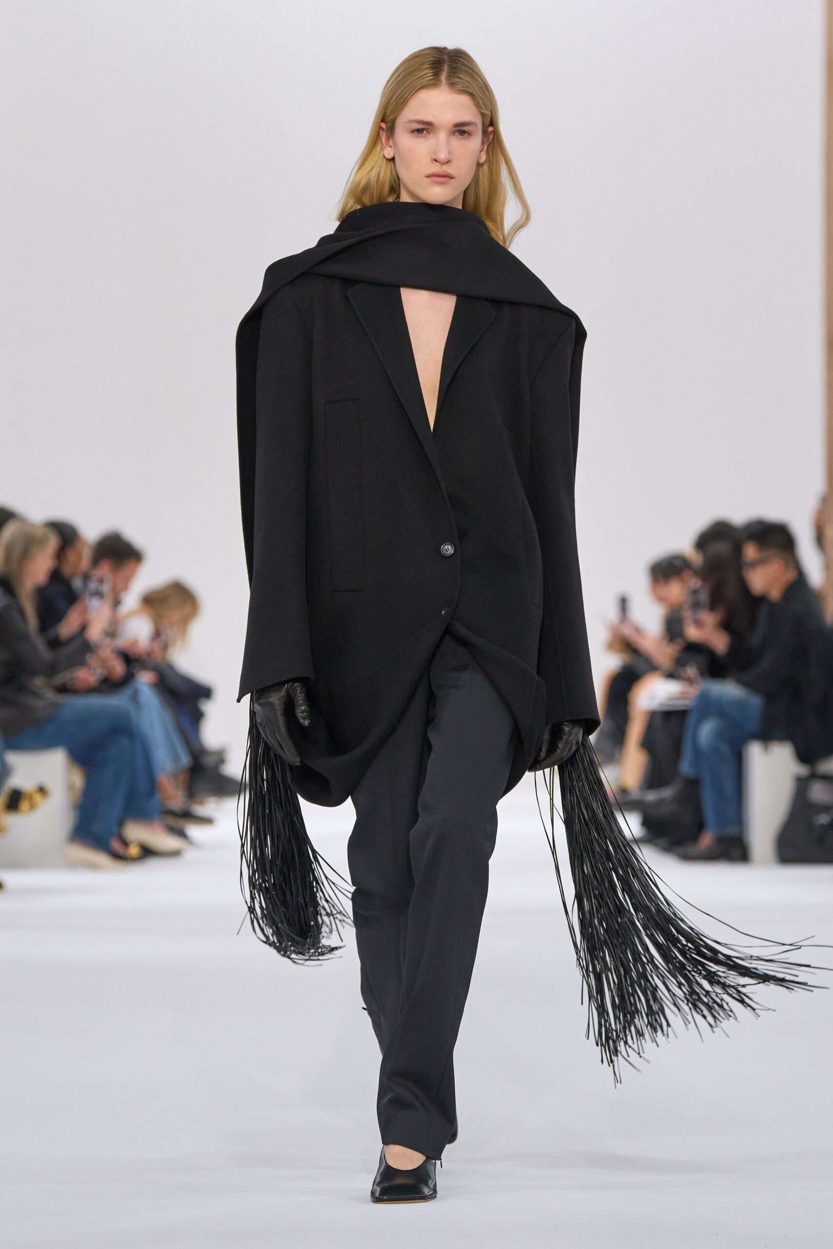 black wool coat with fringes