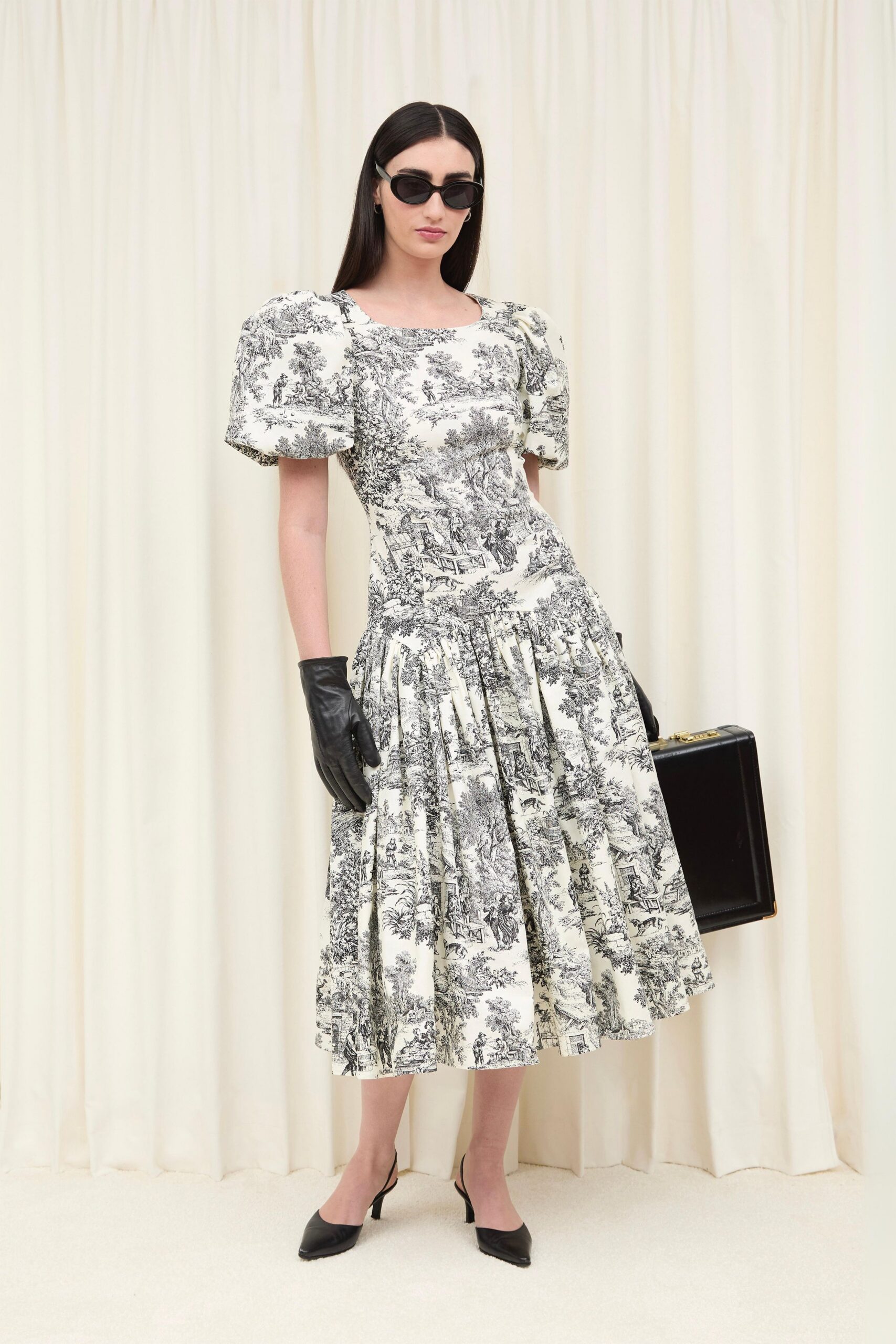 black cotton short-sleeve square-neck fitted pleated flared dress
