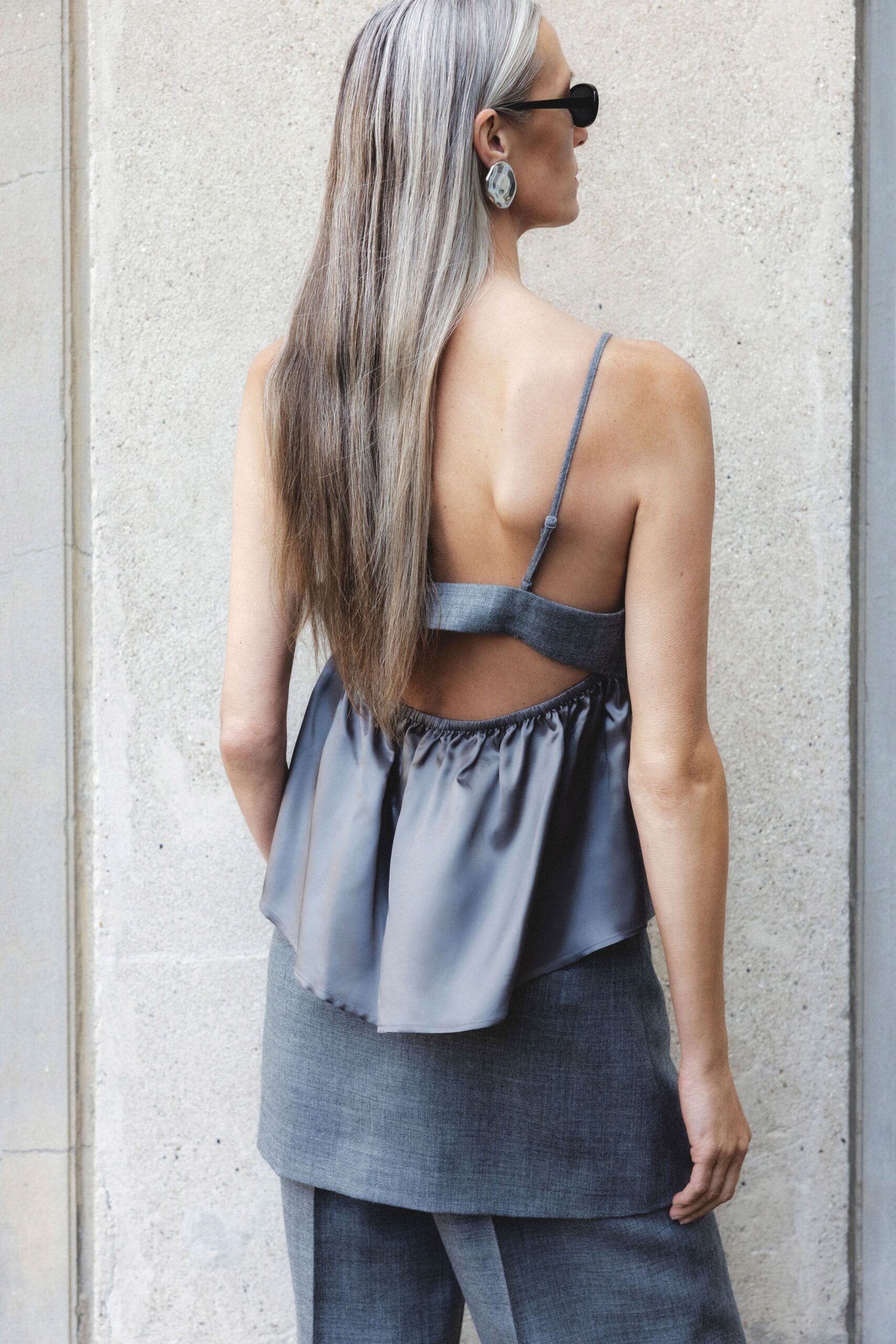 gray relaxed top with tailored pants