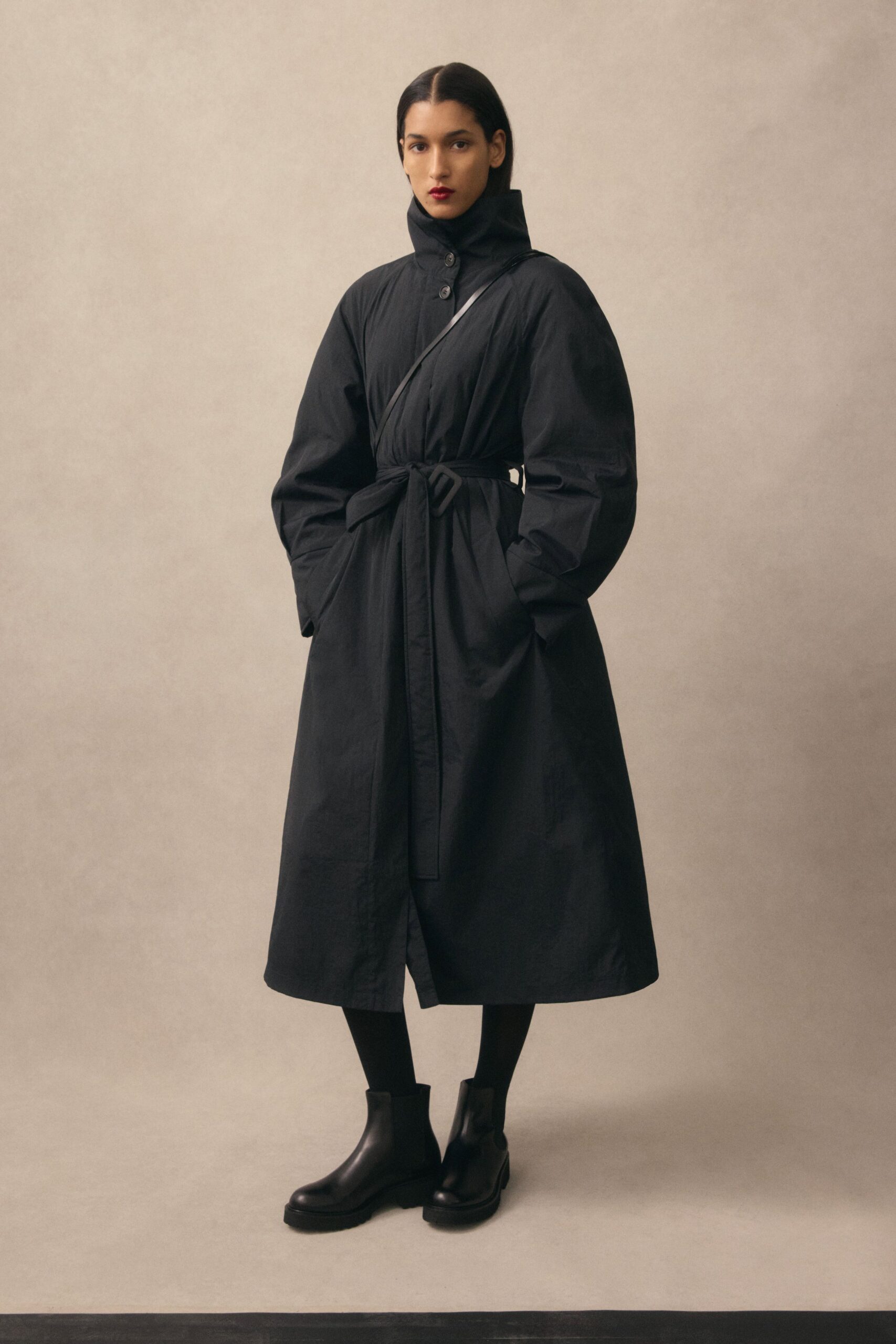 black relaxed coat with boots