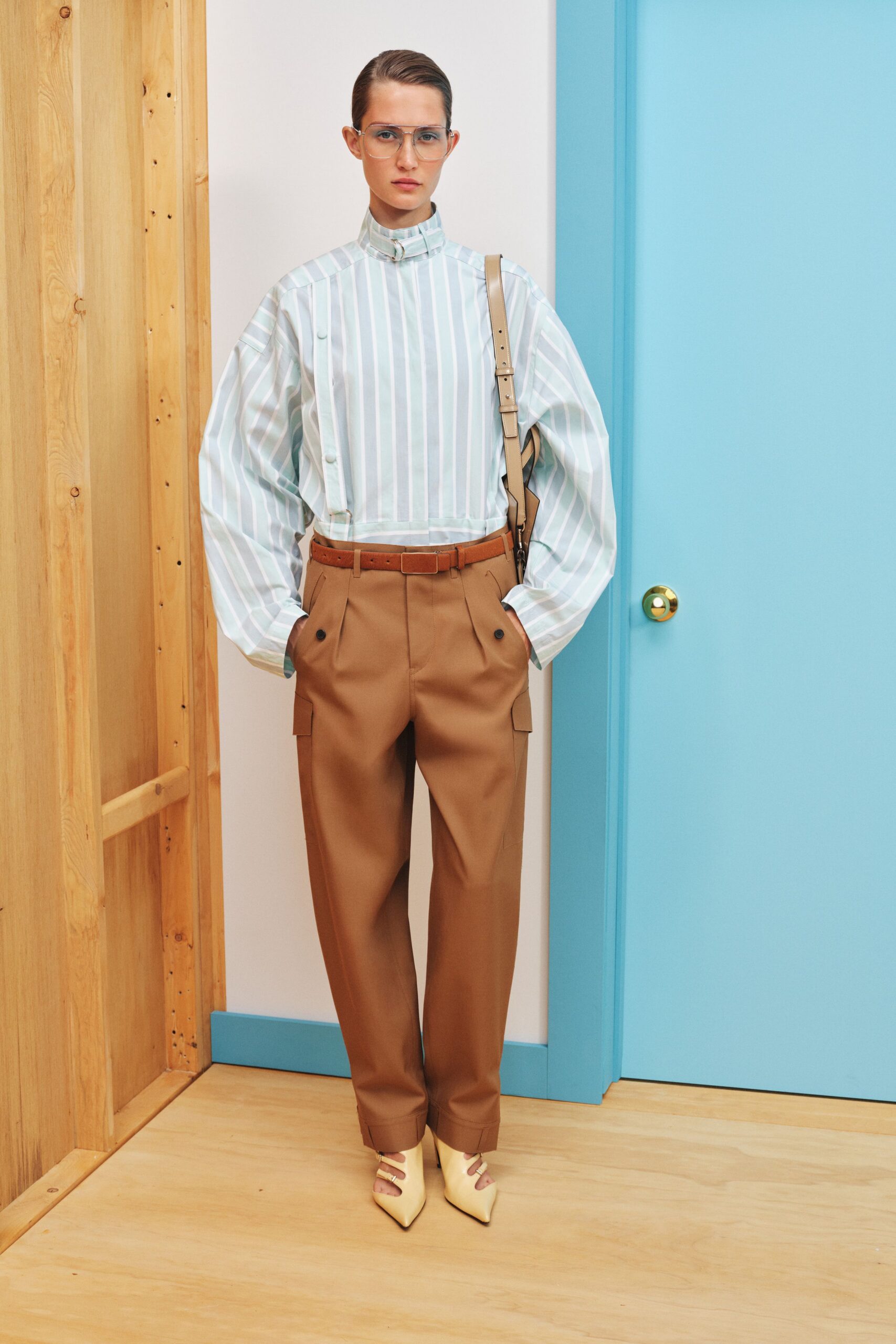 blue striped shirt brown cargo pants