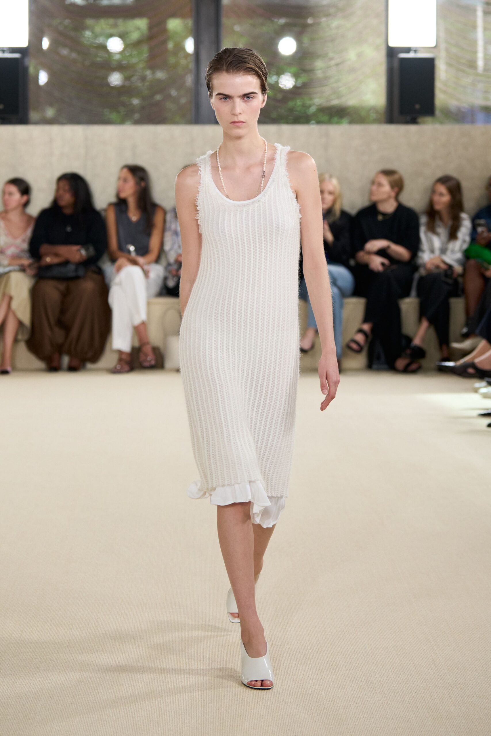 white fitted midi dress with open-toe shoes