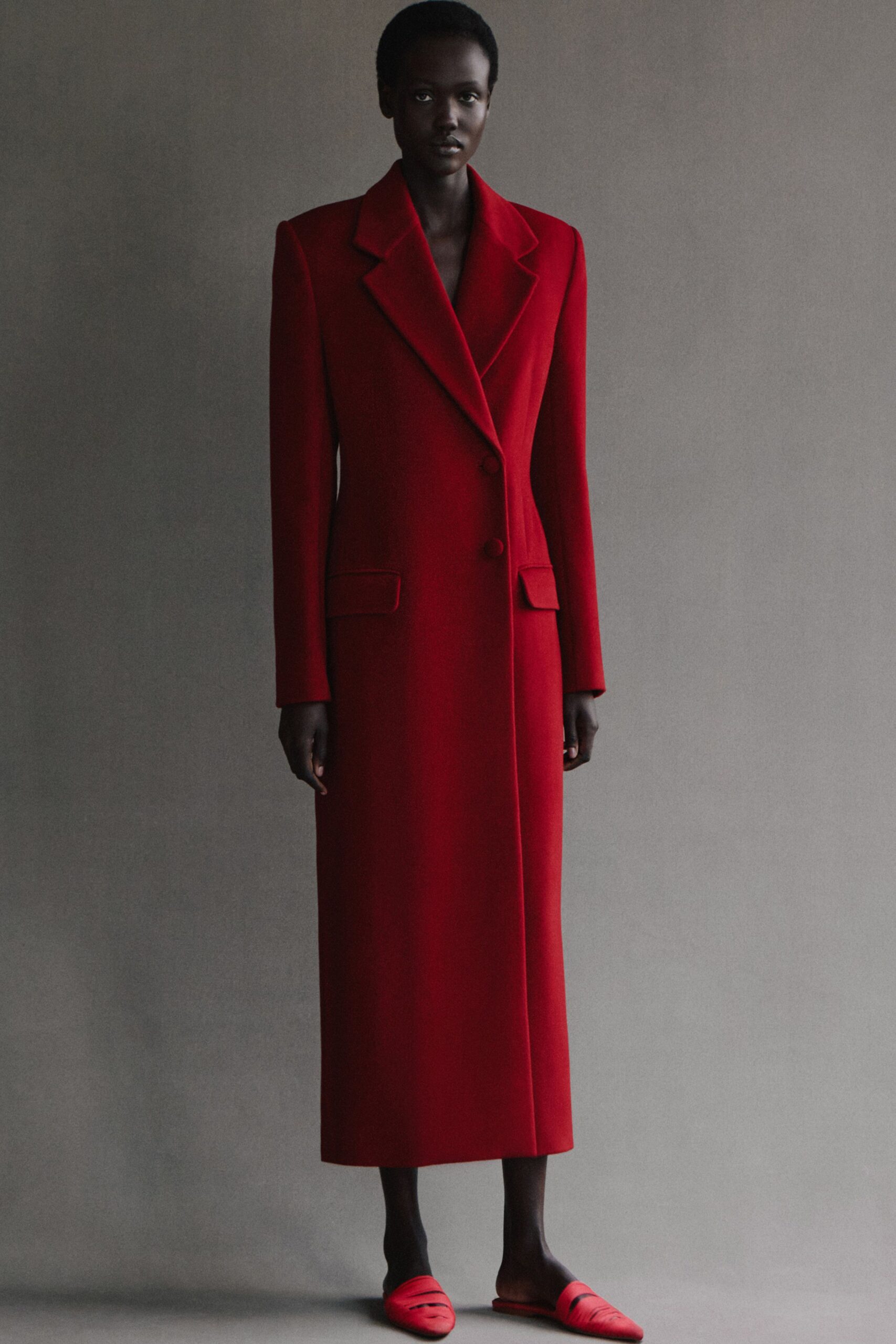 red wool long-sleeve collared tailored buttoned maxi coat