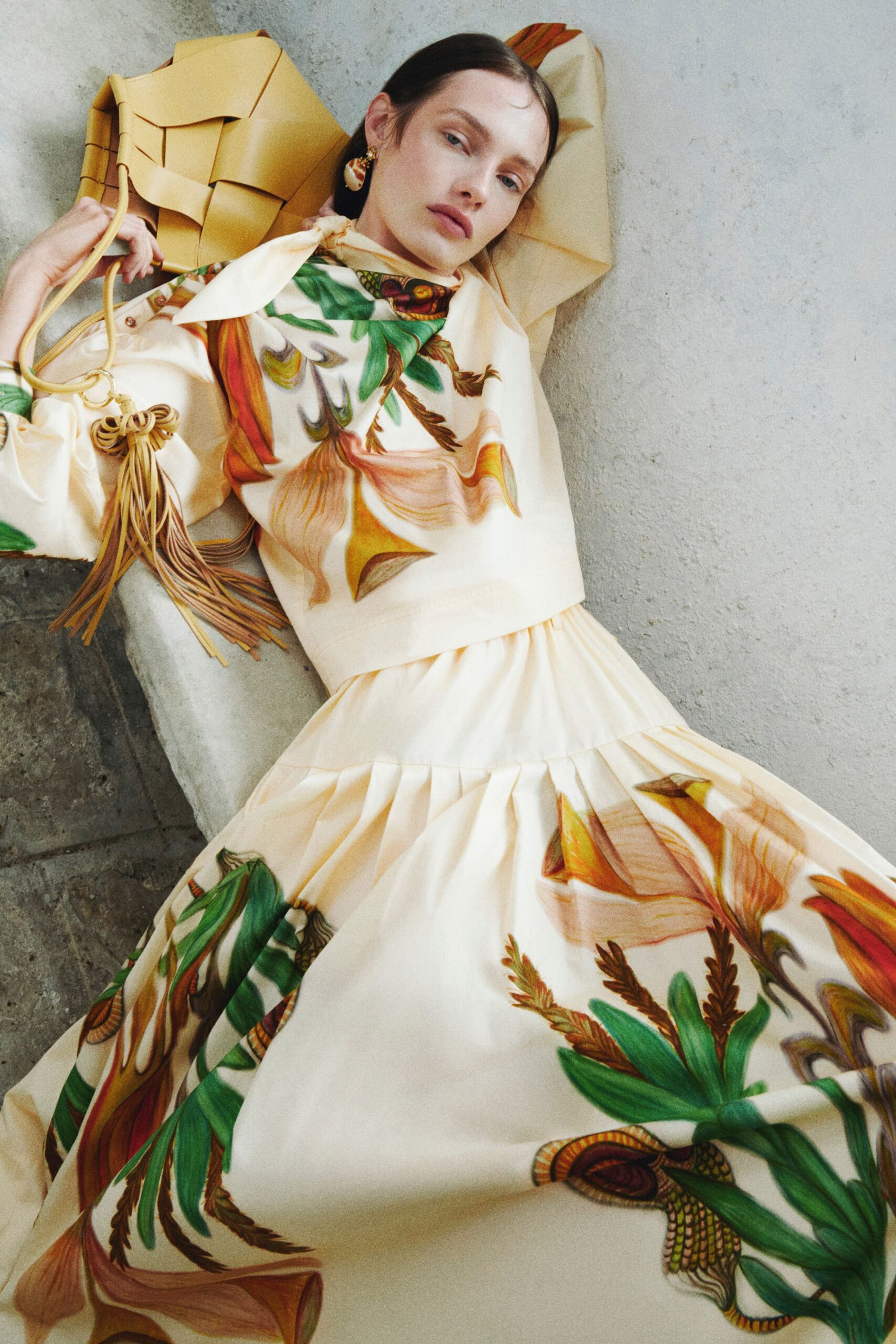 cream embroidered top and pleated skirt