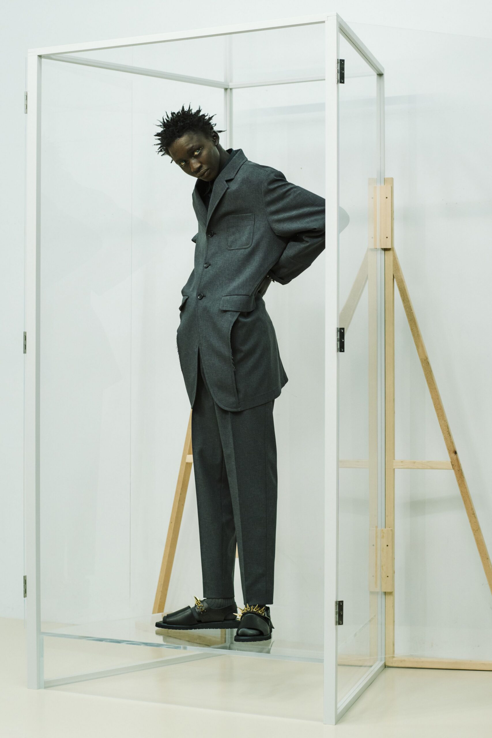 gray tailored suit with embellished shoes