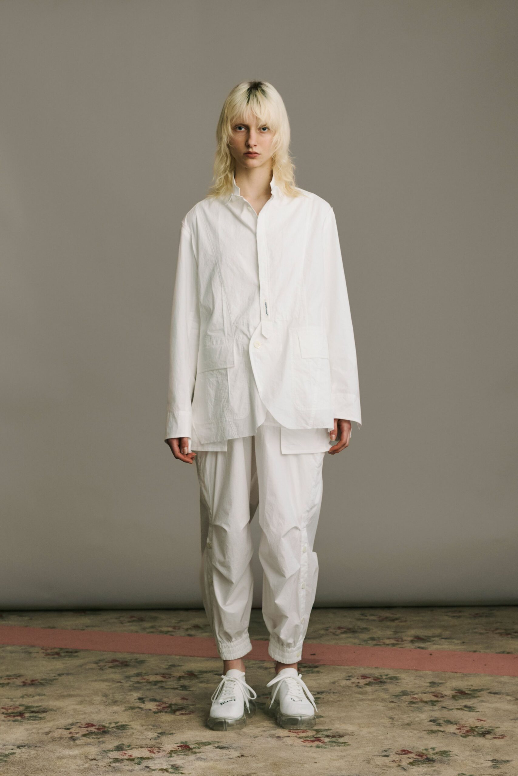white relaxed shirt and pants