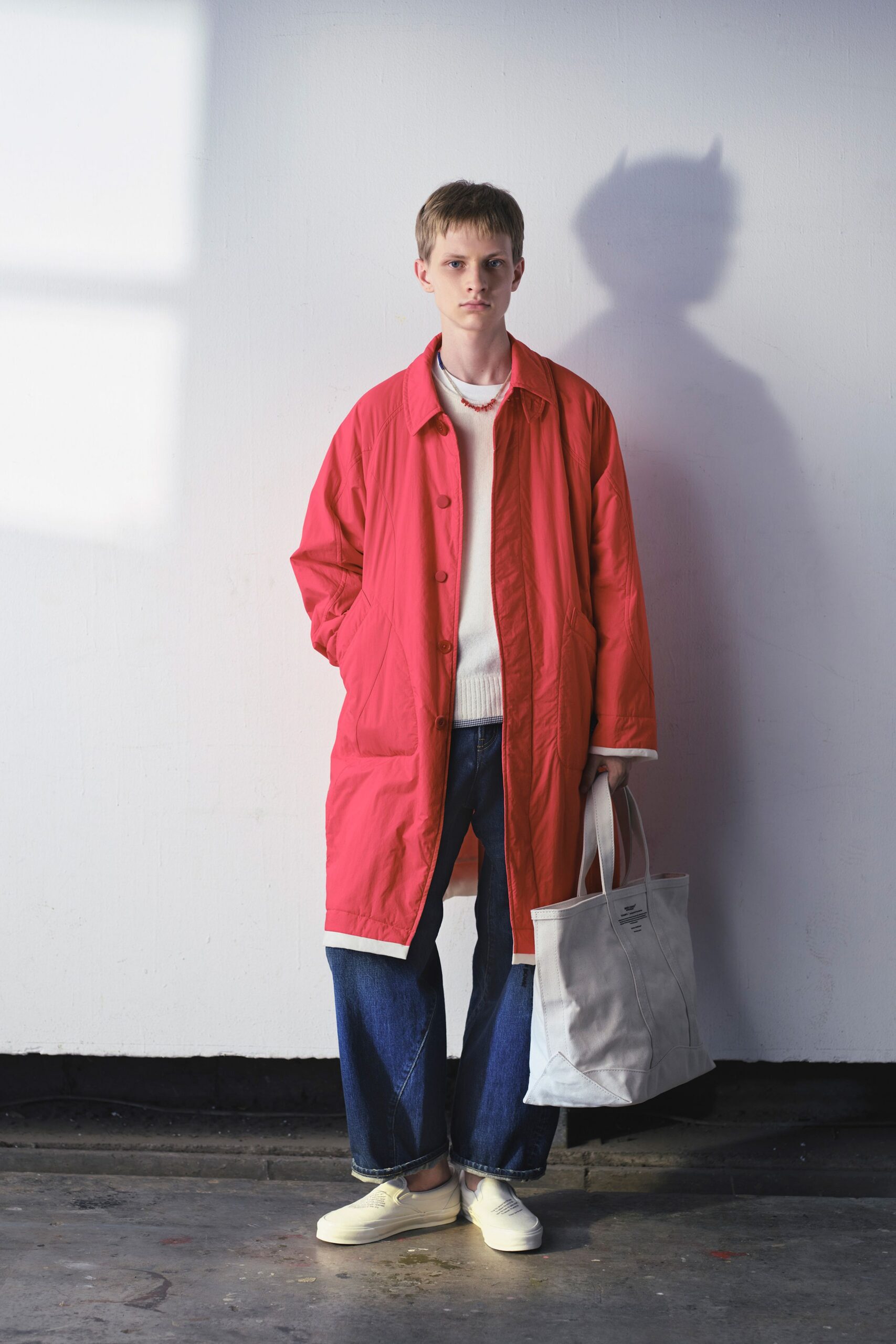 red cotton long-sleeve collared relaxed buttoned coat