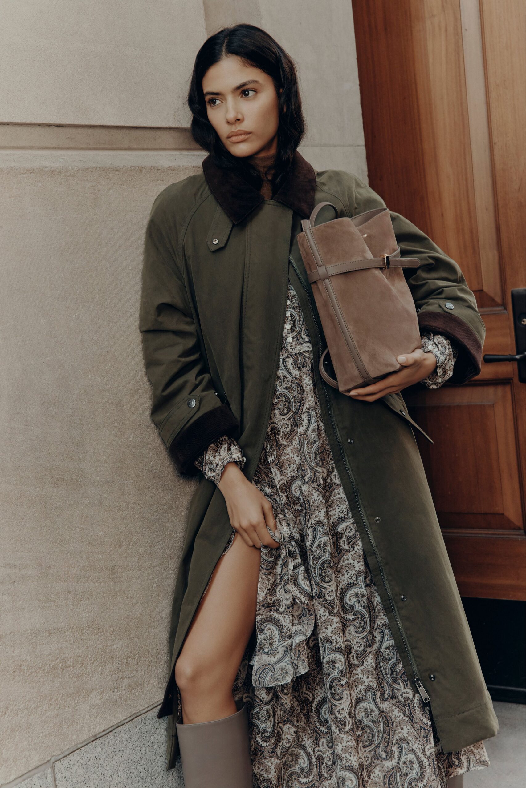 green coat multi-colored dress