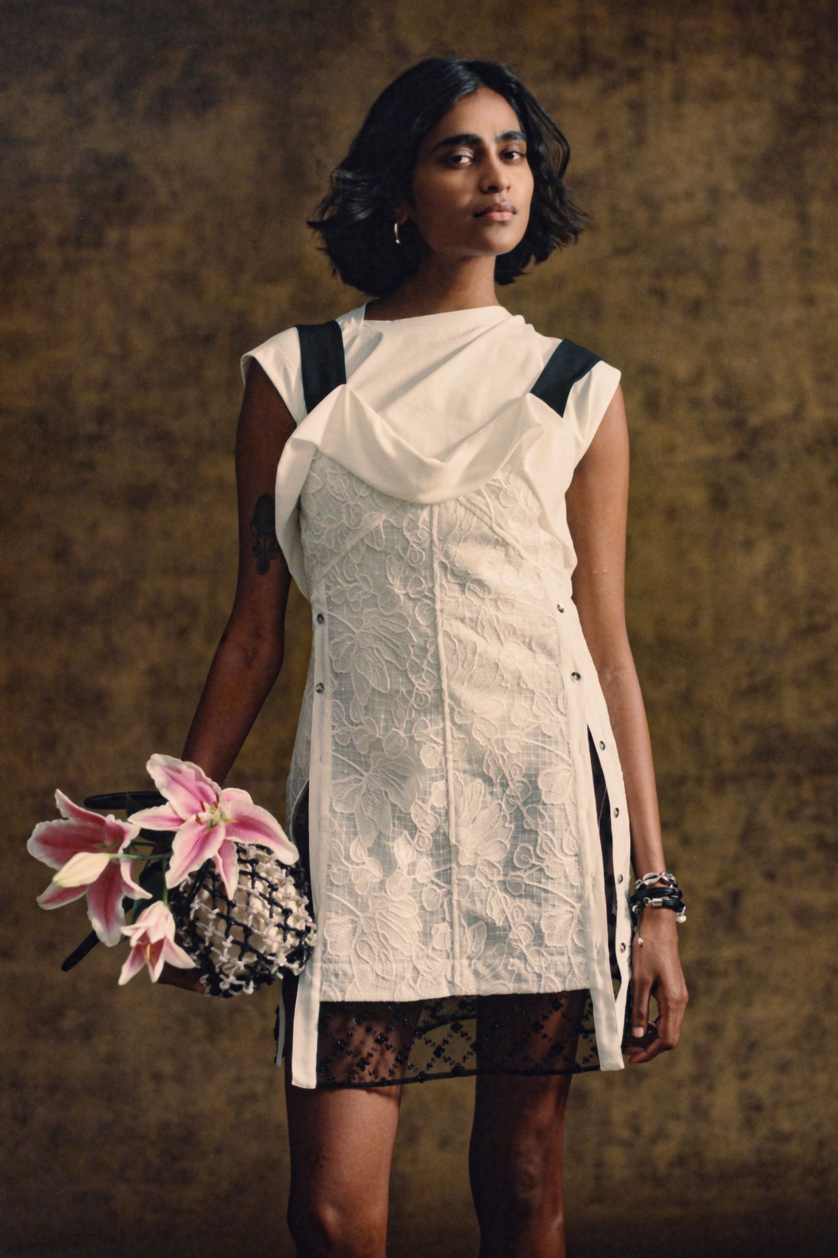 white fitted dress with black lace skirt