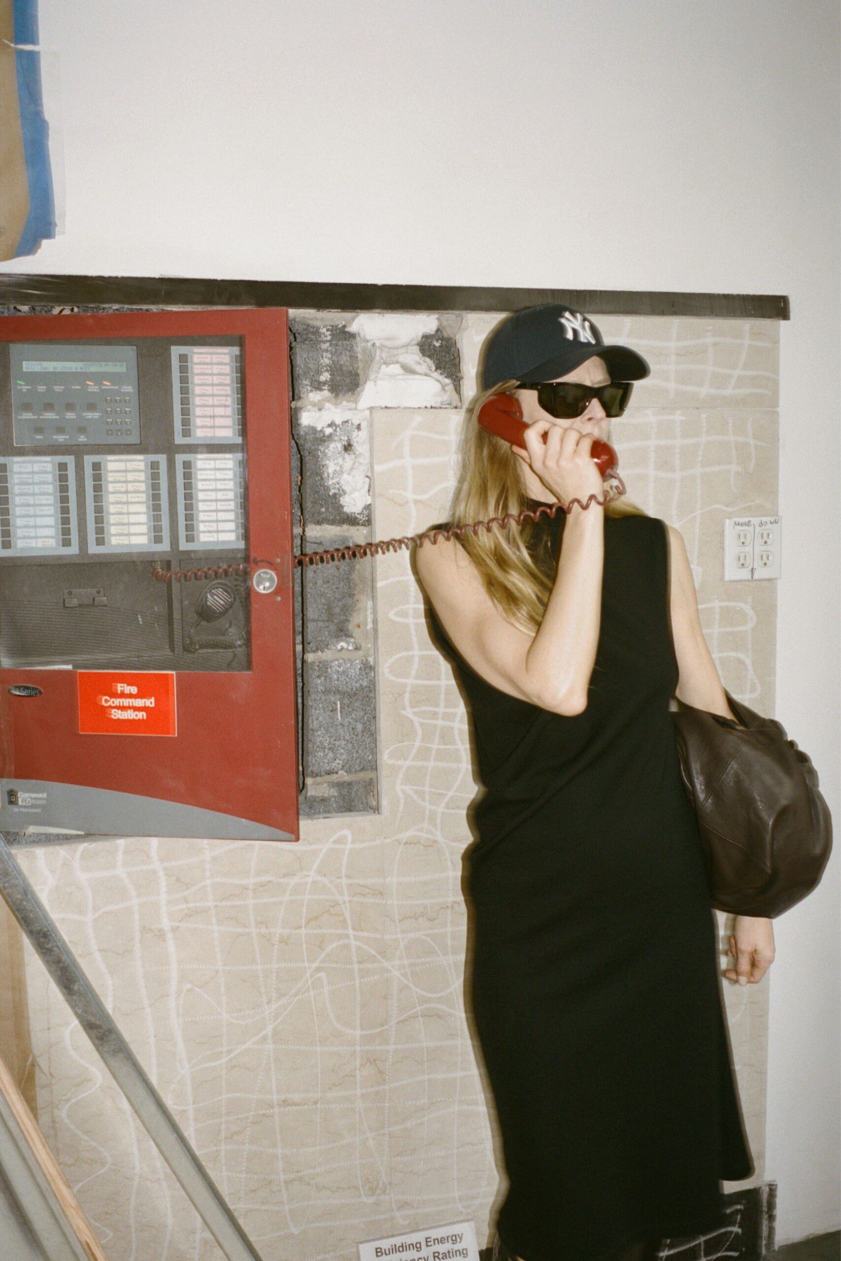 black fitted sleeveless dress