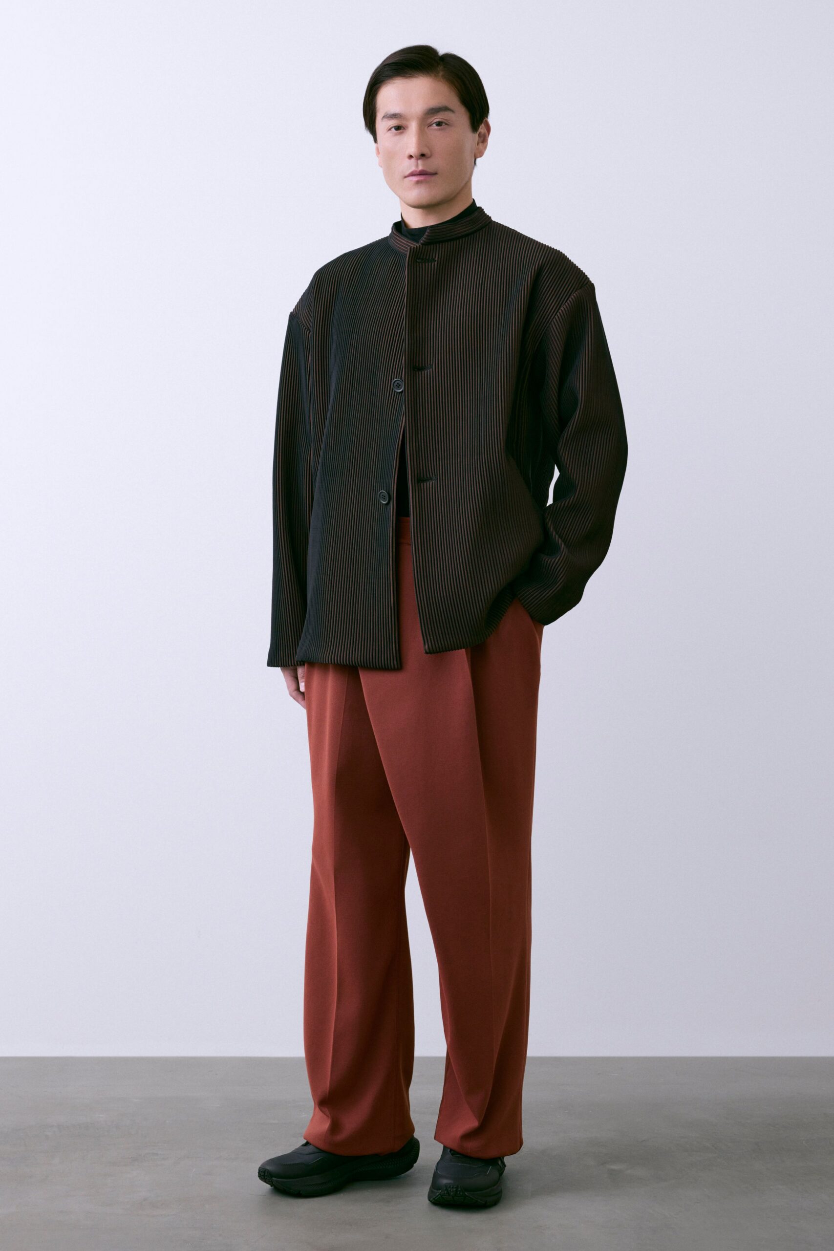 black striped shirt with red pants