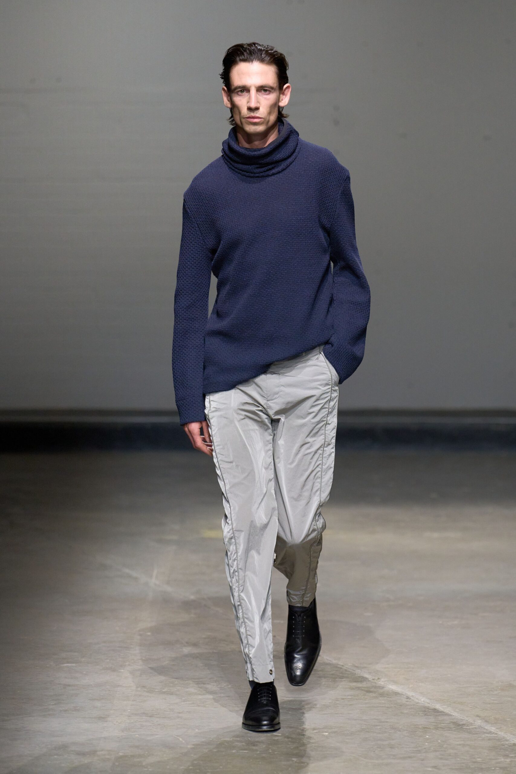 blue relaxed sweater with gray cargo pants