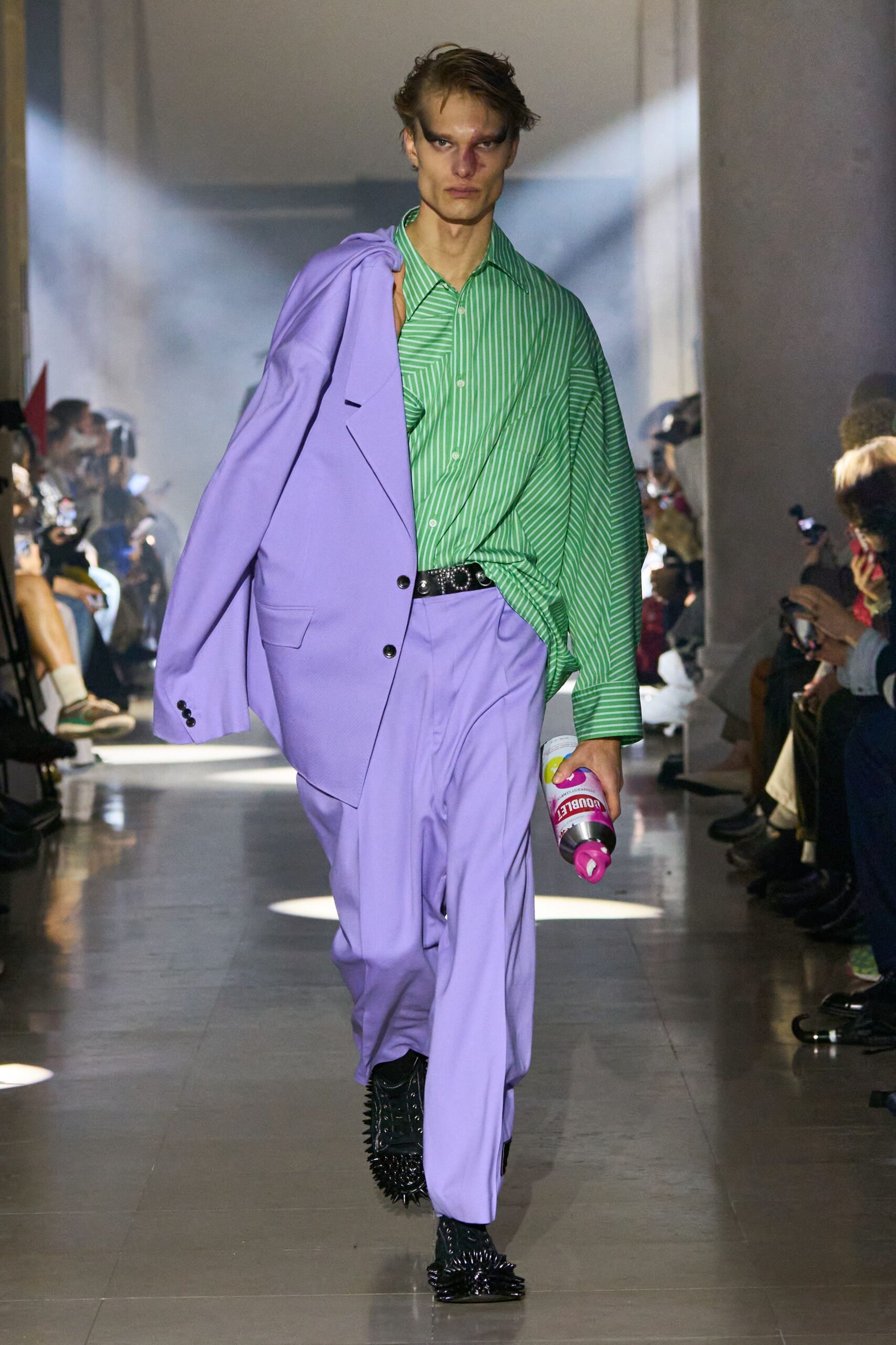 purple tailored blazer with green striped shirt
