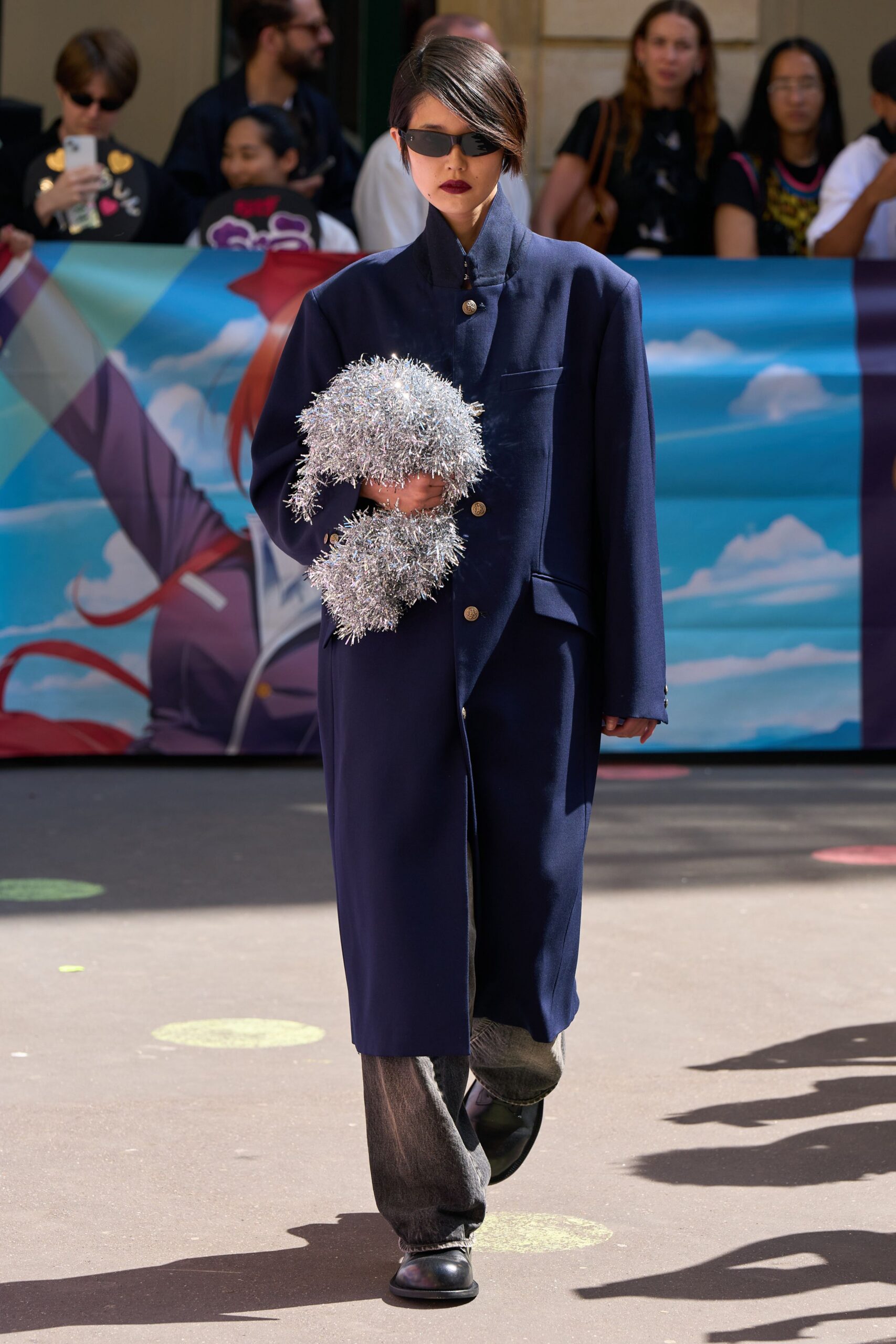 blue wool coat with gray pants