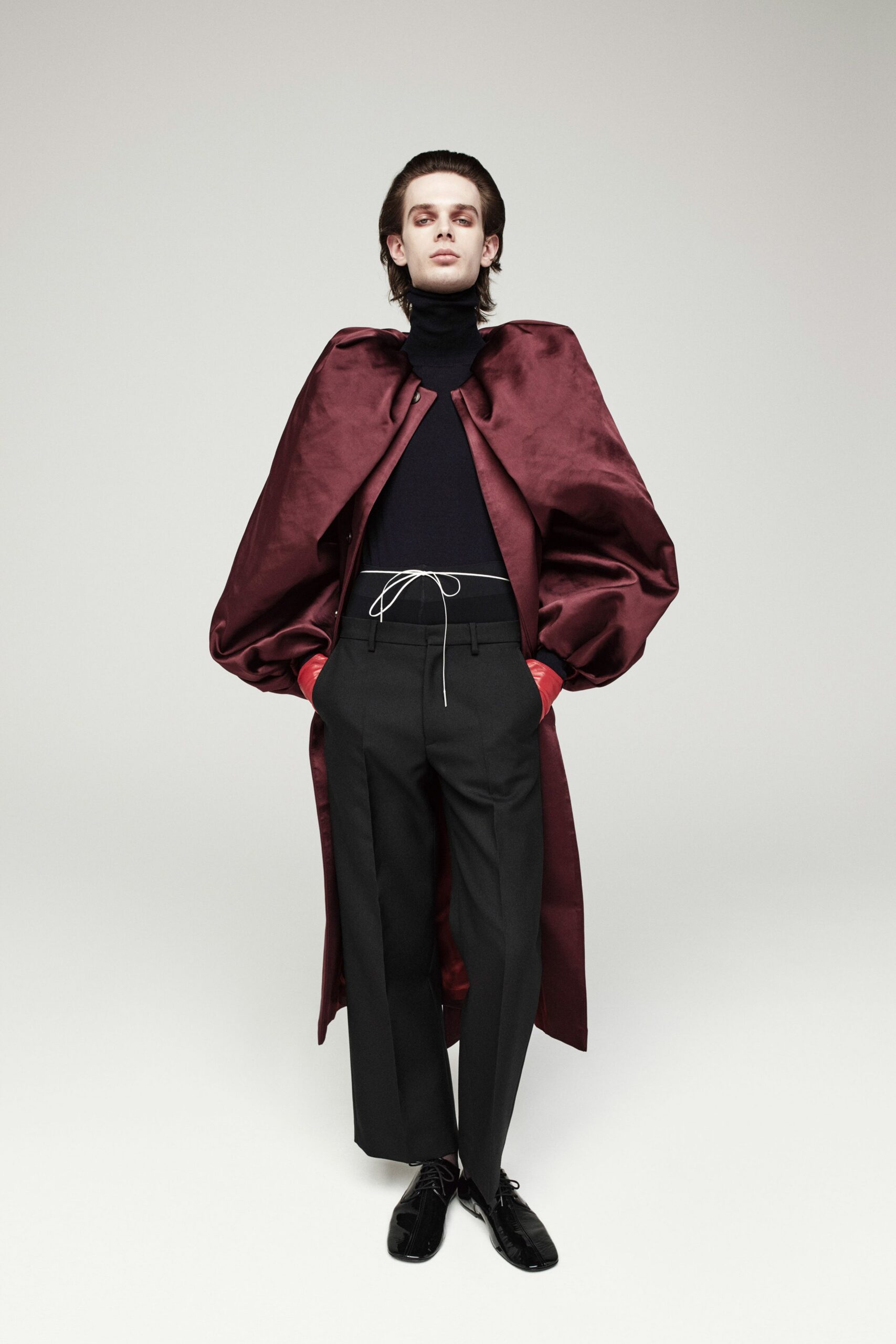 red silk cape black top and pants
