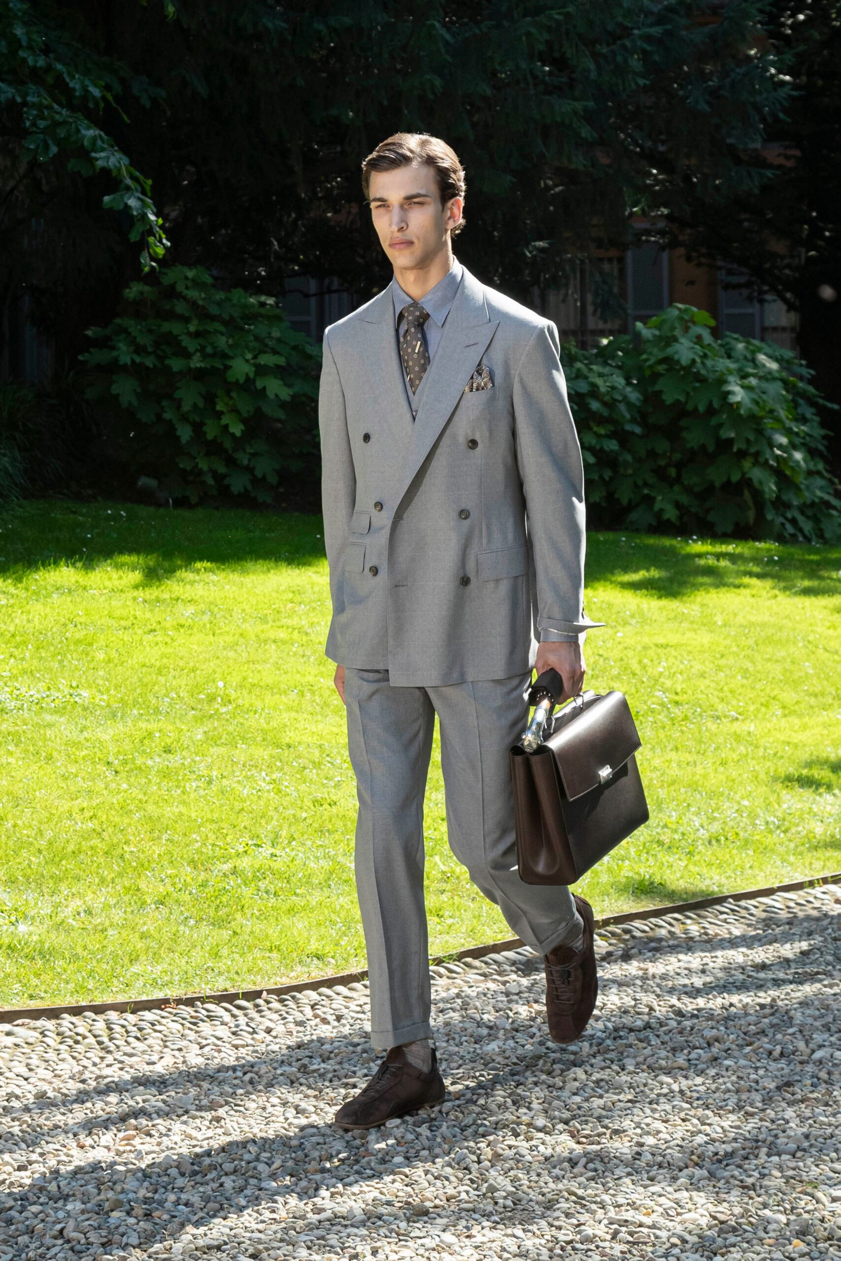 gray tailored suit with brown shoes