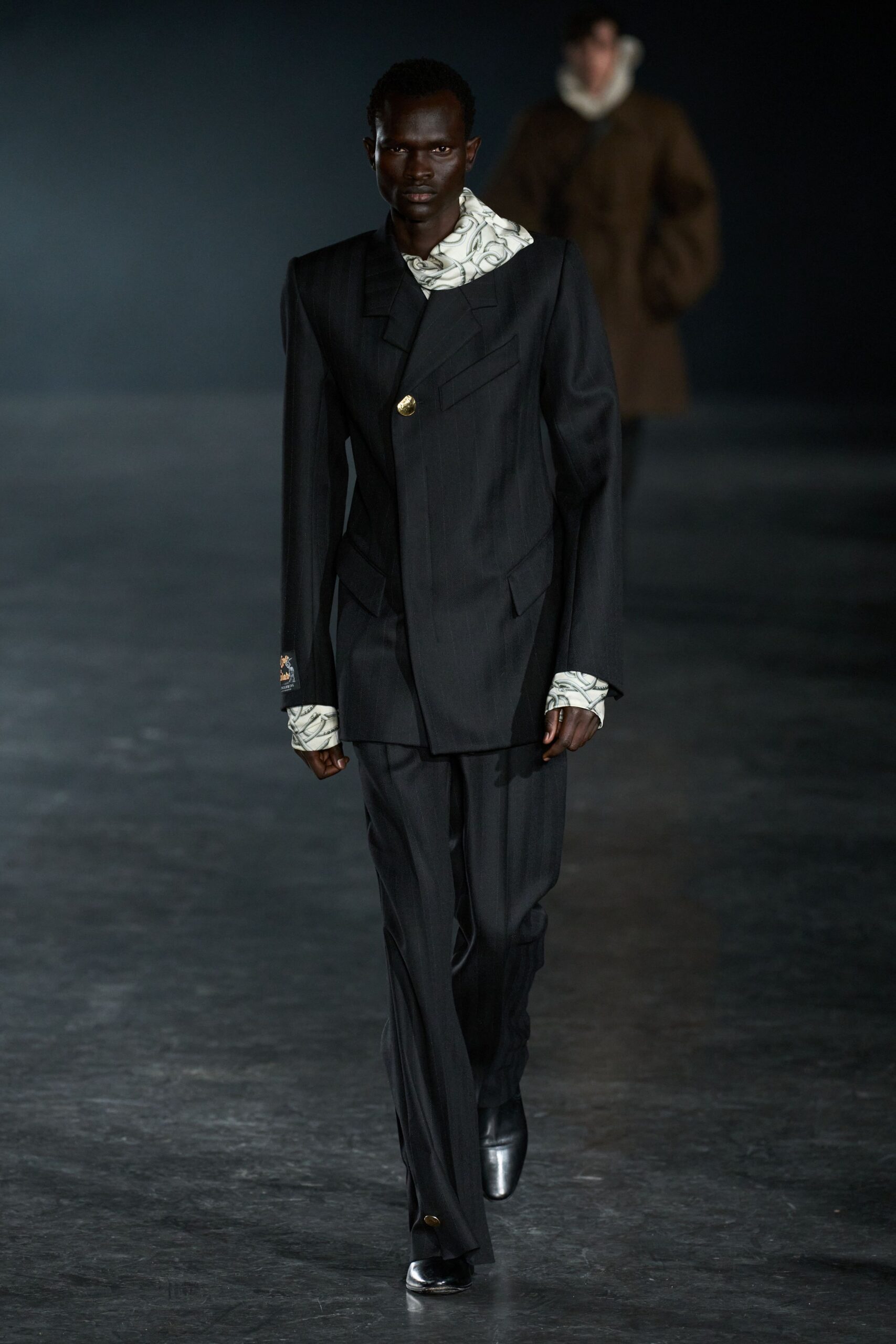 black tailored suit with white shirt