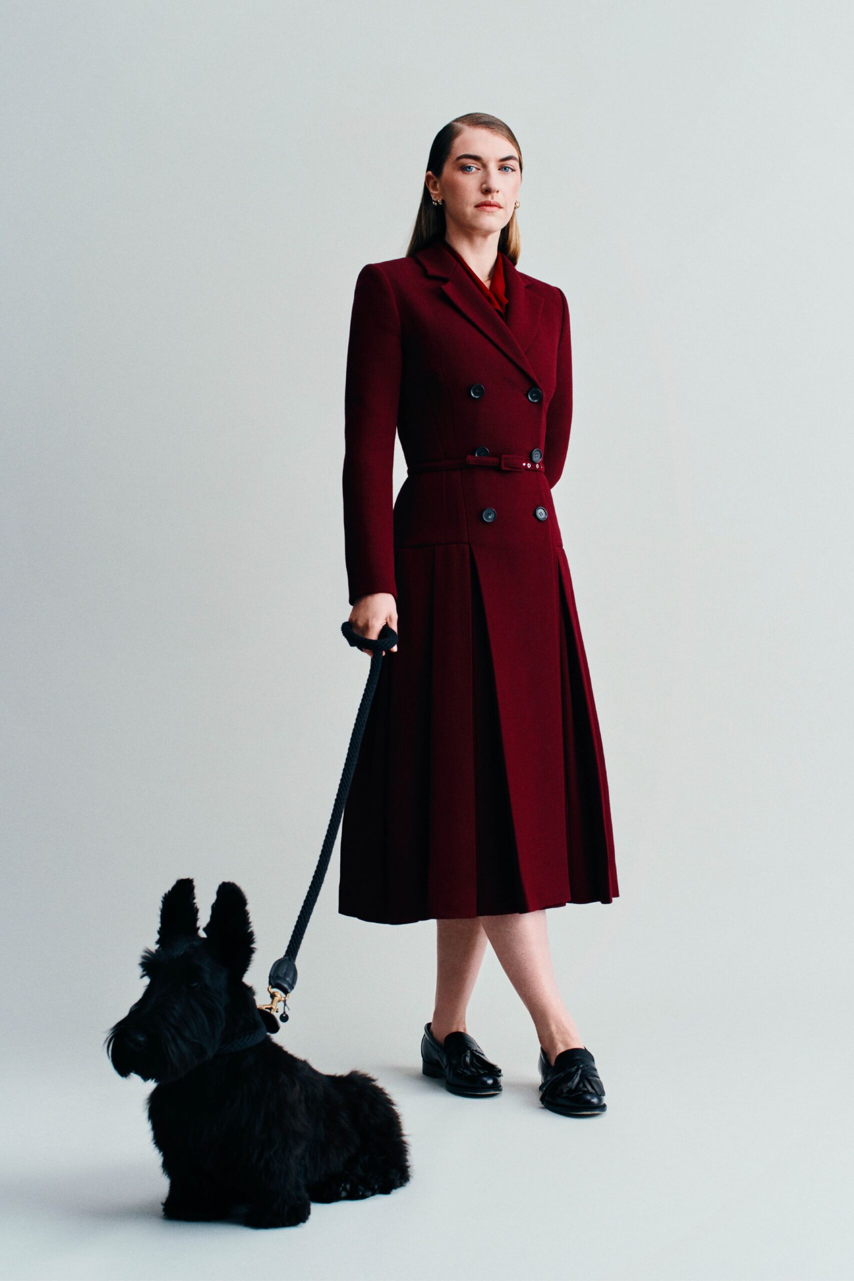 red wool long-sleeve collared fitted pleated belted dress