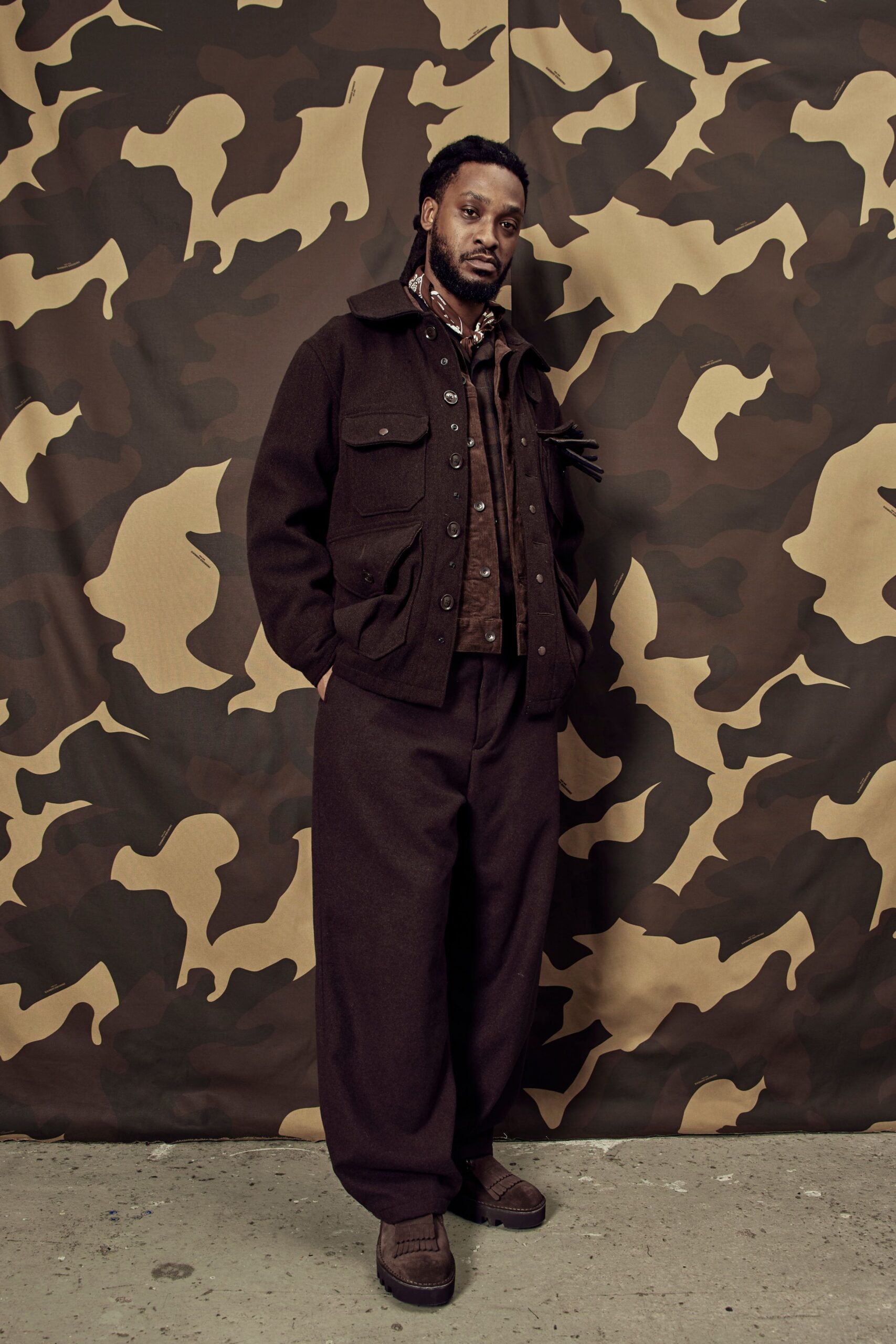 brown wool long-sleeve collared relaxed buttoned pockets jacket