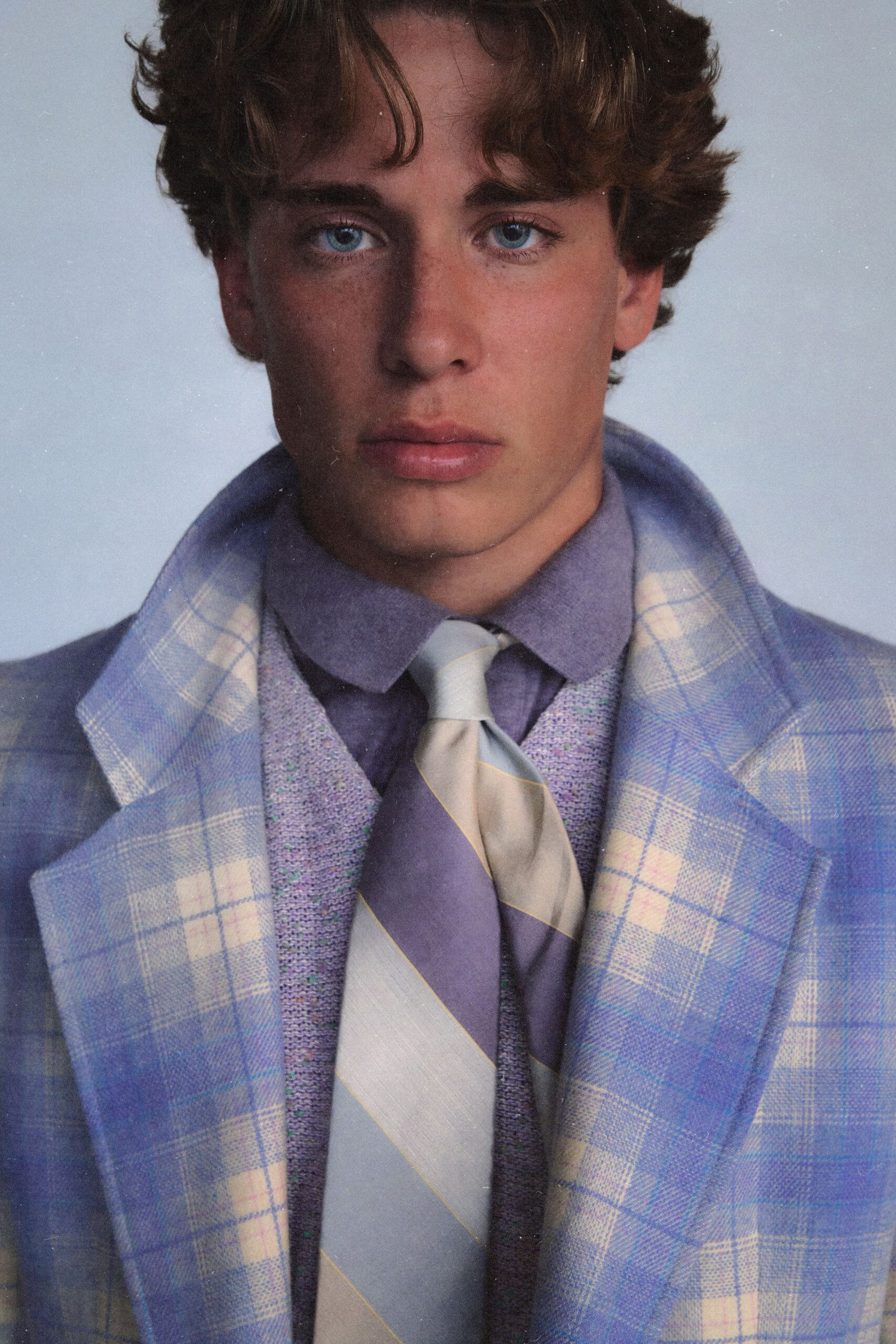 blue checked blazer with purple shirt