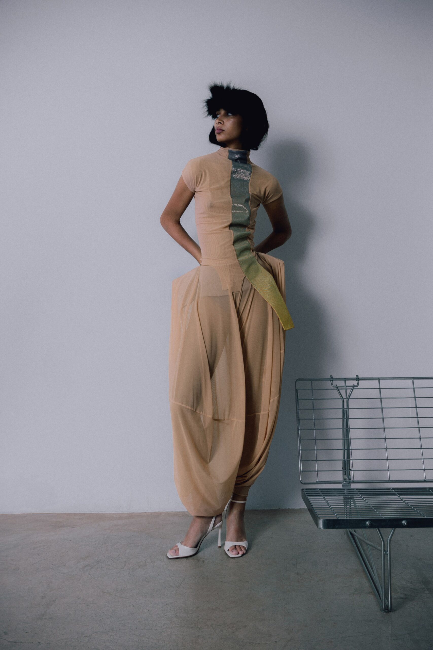 beige fitted top and relaxed pants