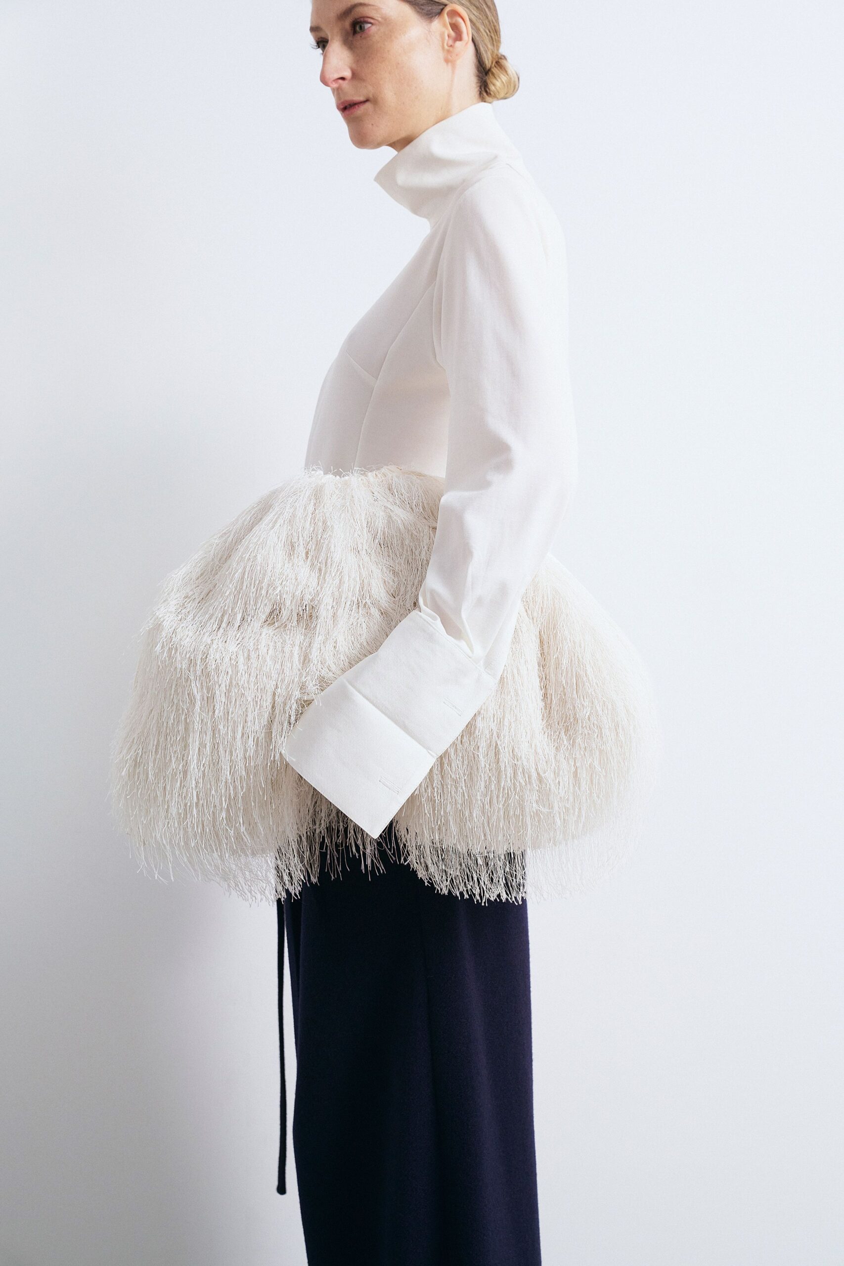 white cotton long-sleeve high-neck fitted ruffled top