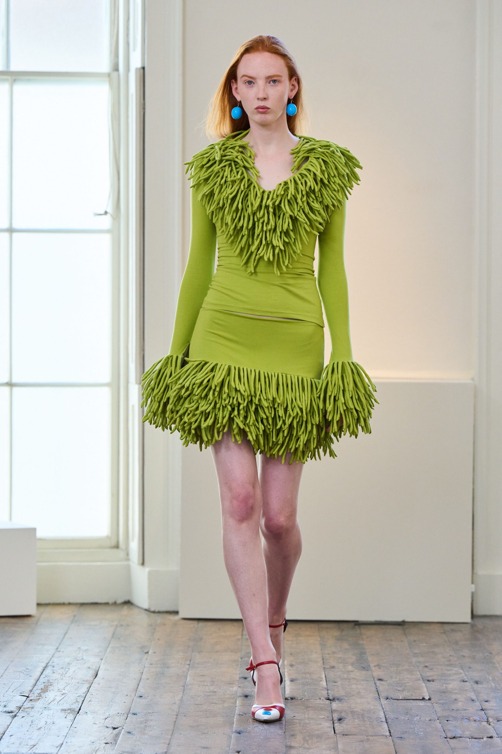 green cotton long-sleeve v-neck fitted ruffled mini dress