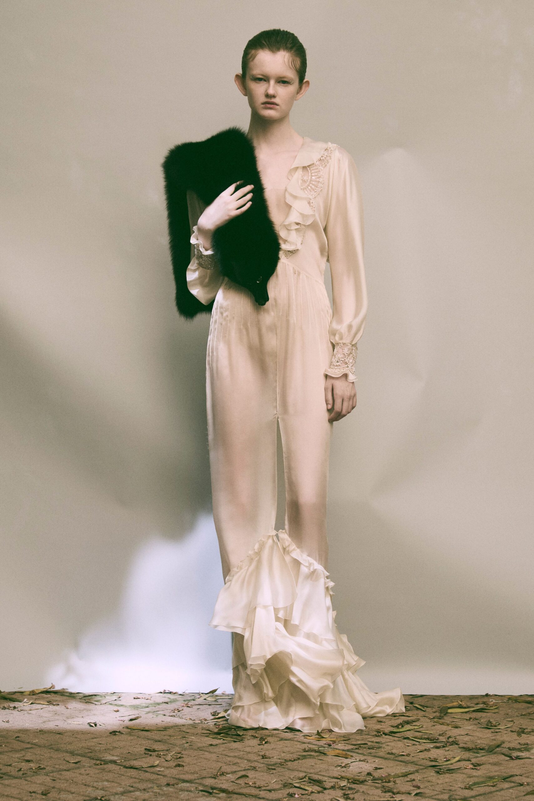 ivory silk long-sleeve v-neck fitted ruffled draped gown