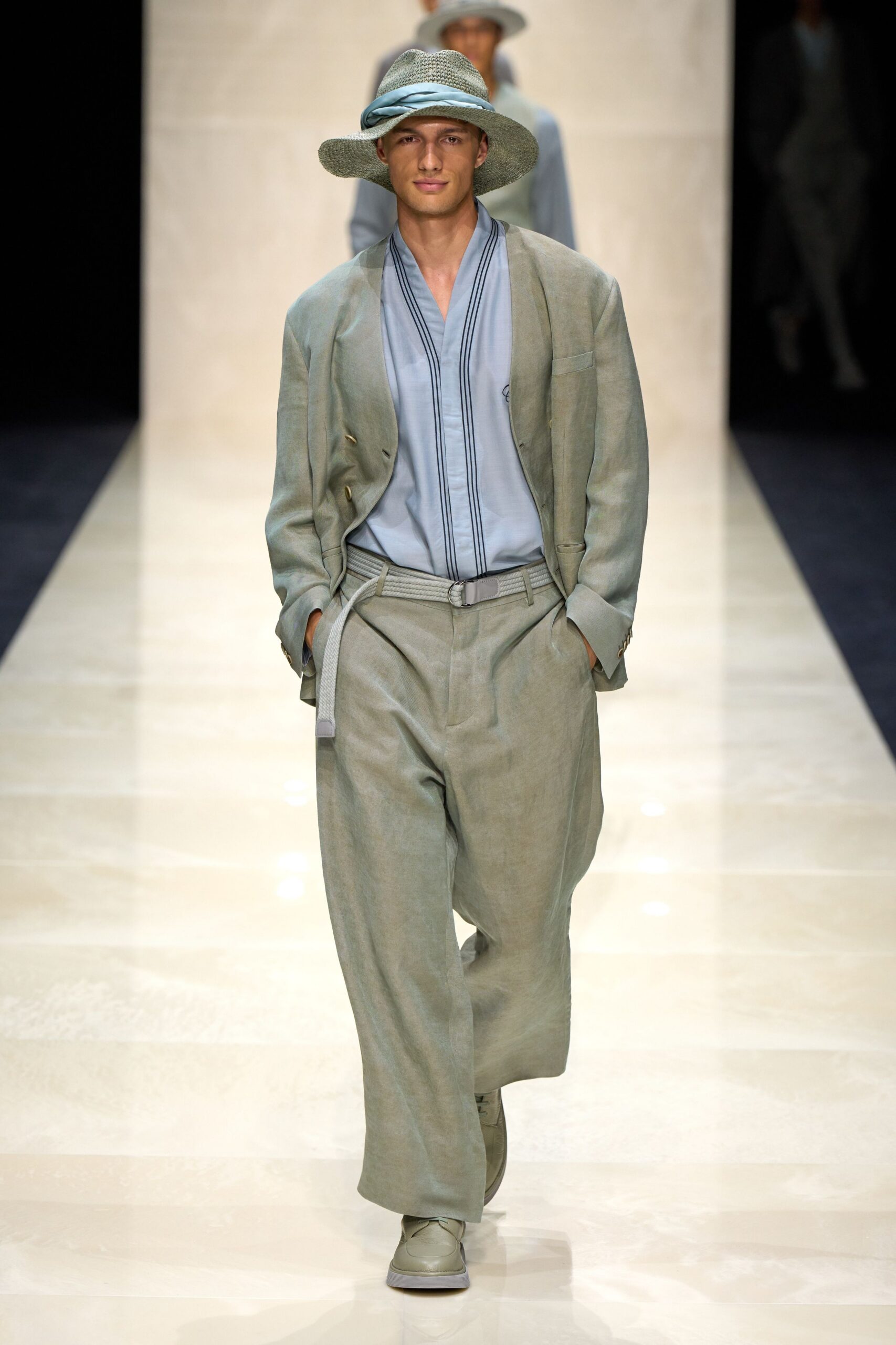green relaxed suit with blue shirt