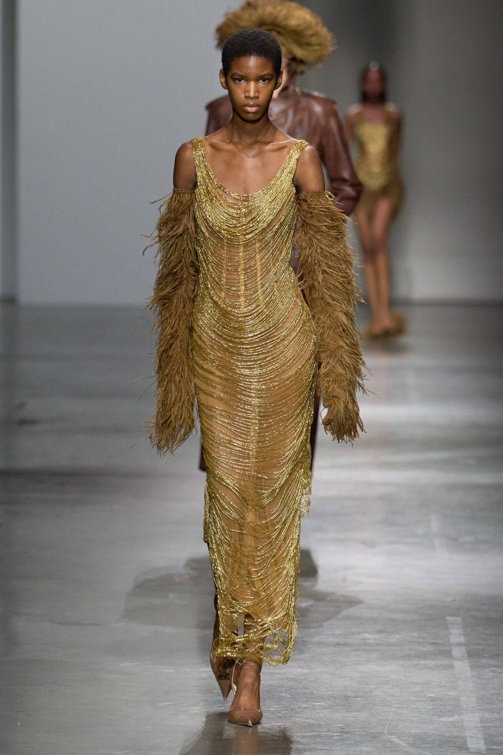 gold draped midi dress with brown fur coat