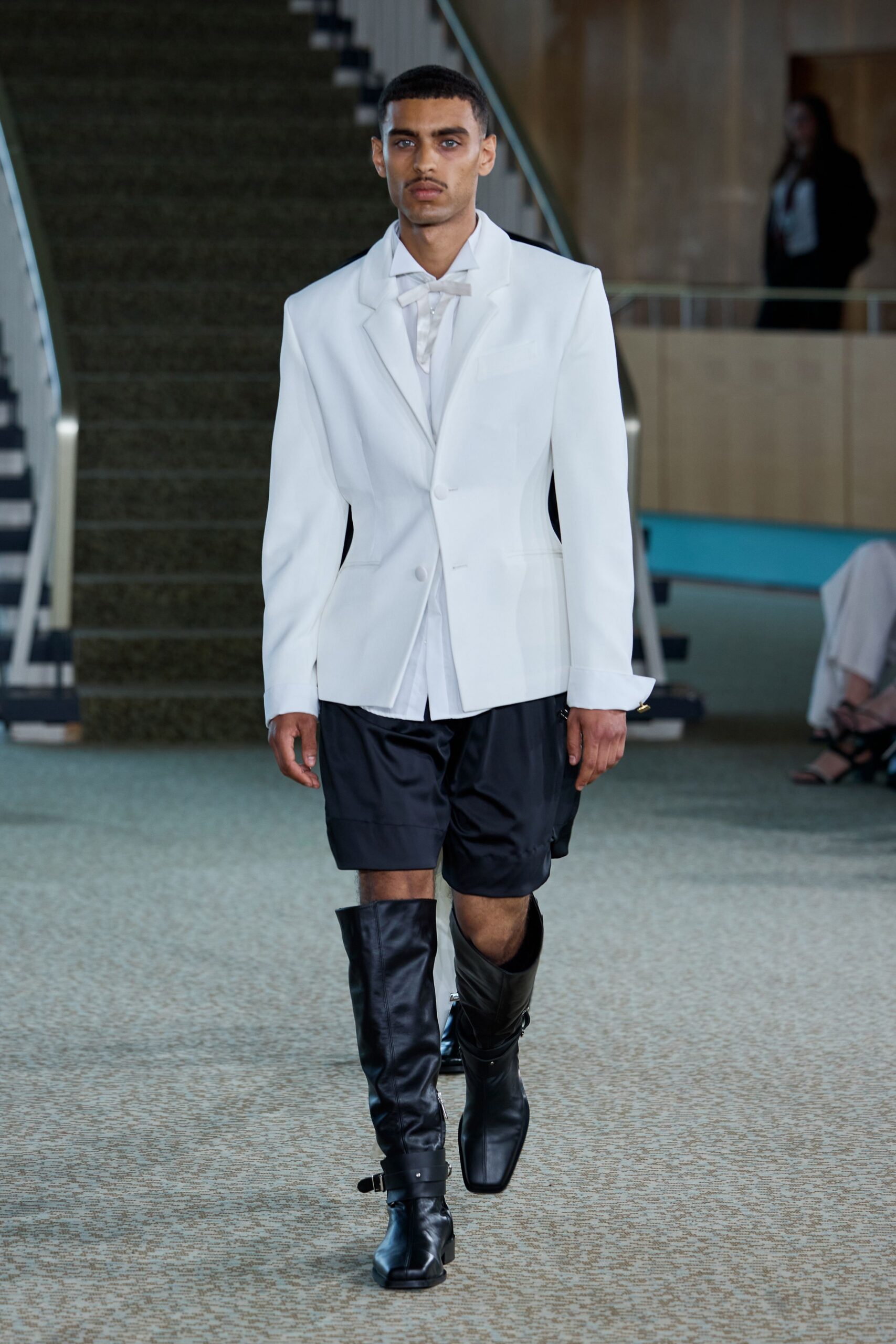 white tailored blazer black shorts