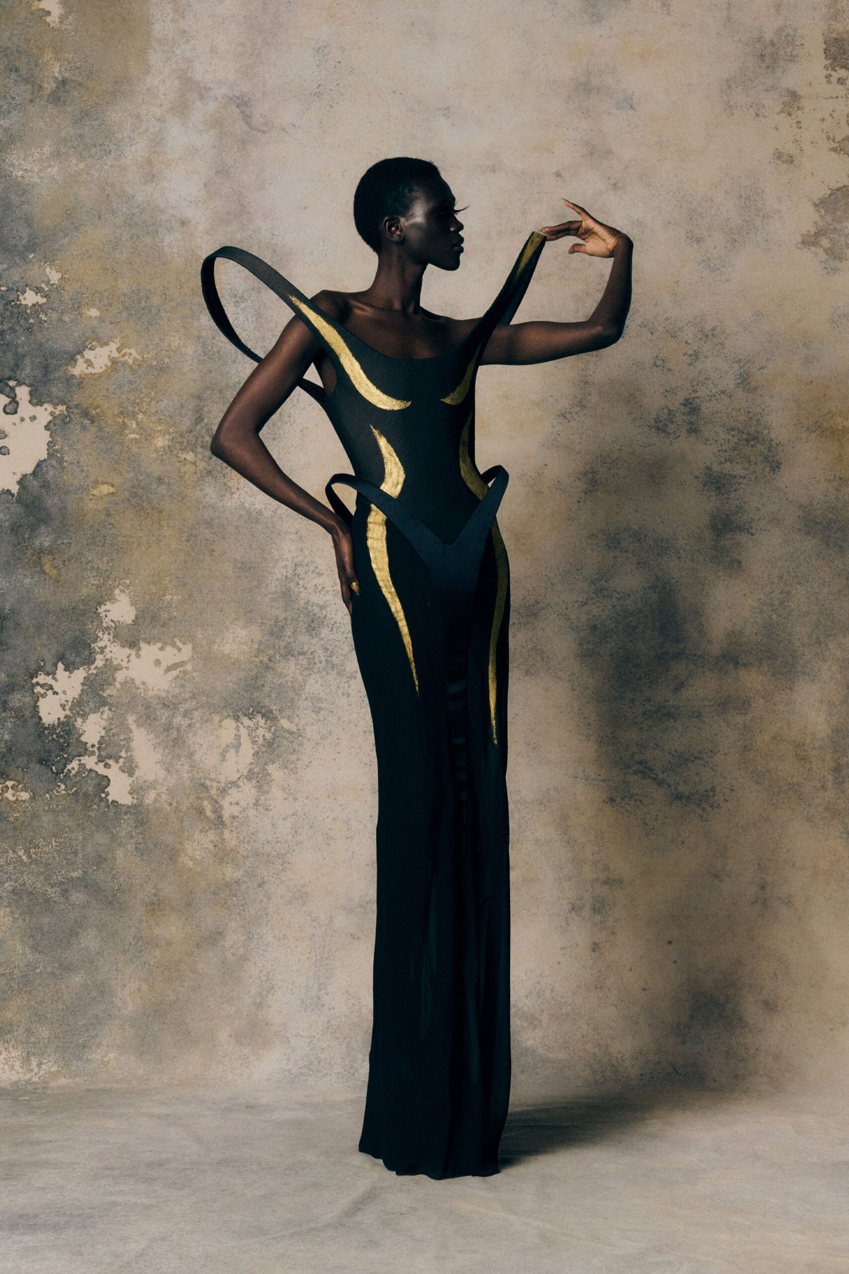 black and gold fitted gown