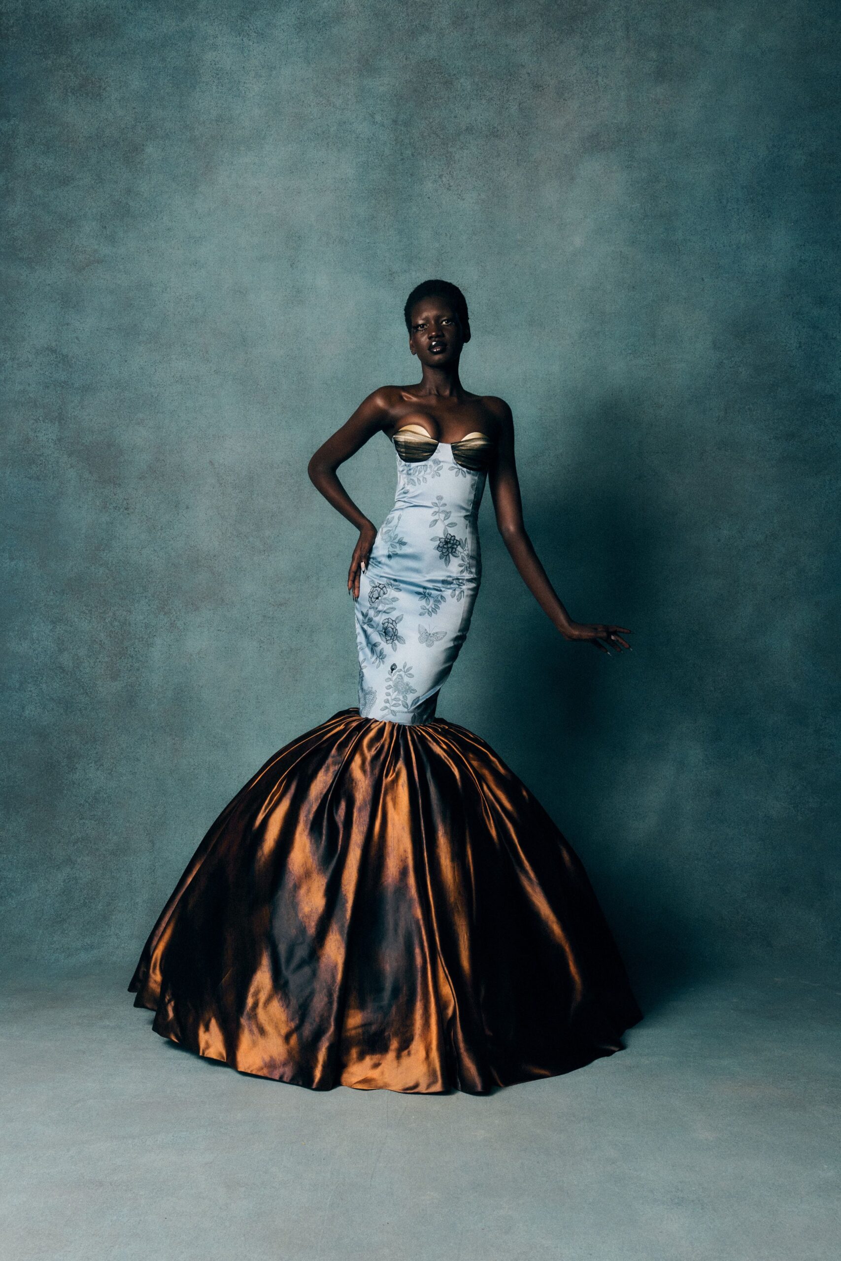 blue and gold strapless gown