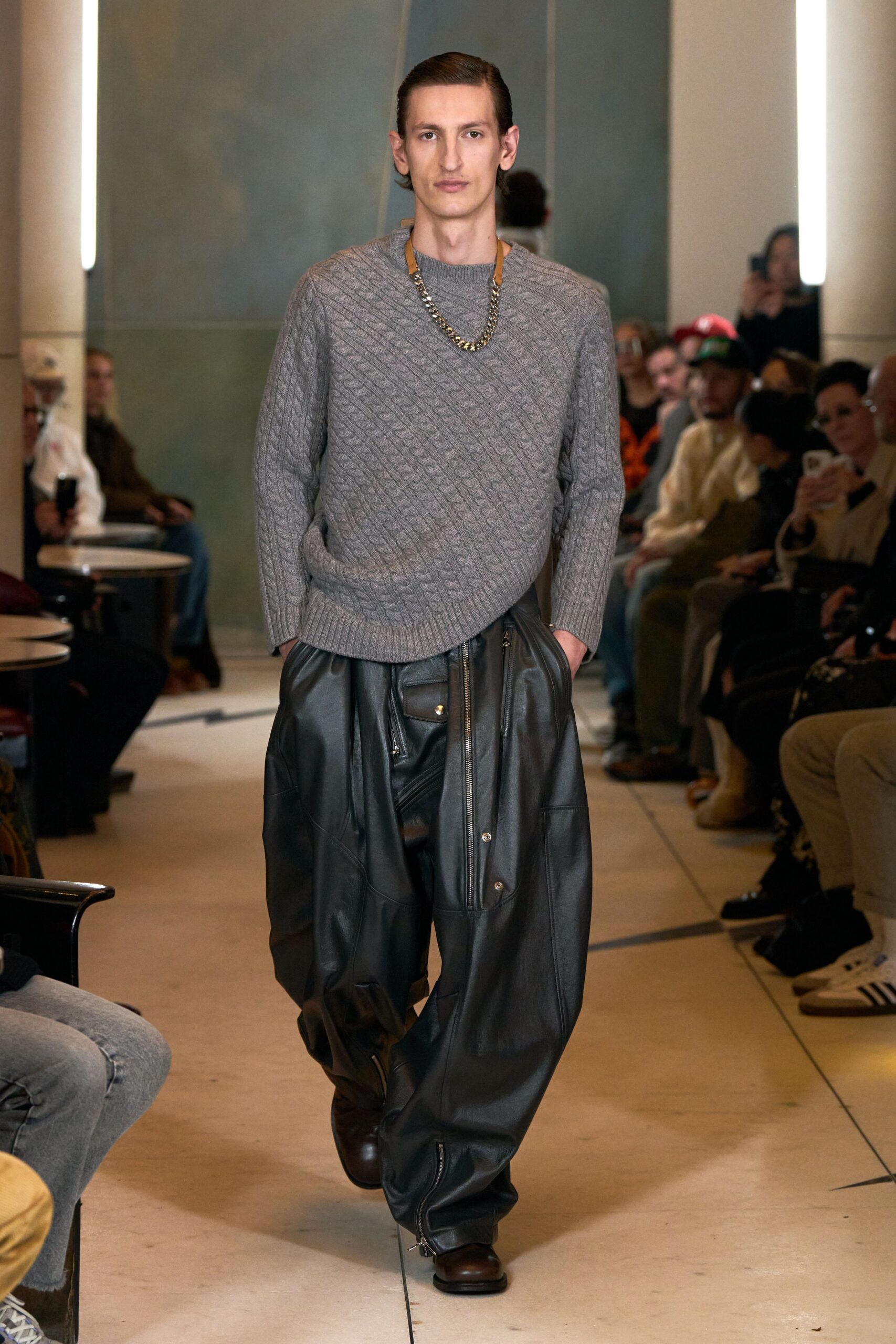 gray wool relaxed sweater with black leather pants