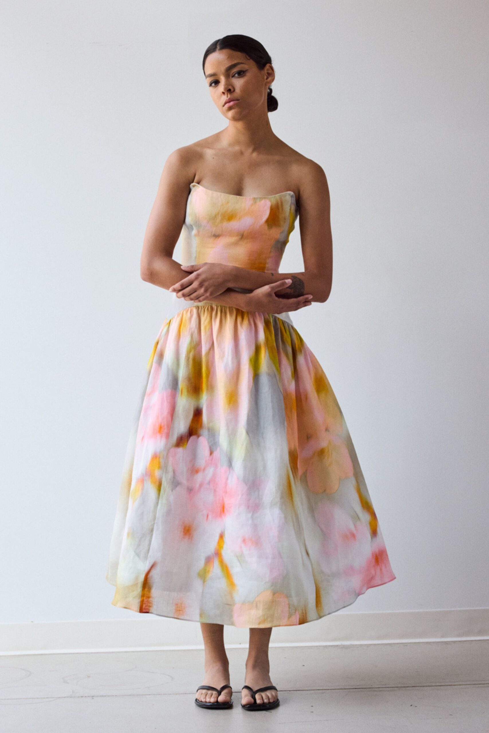pink cotton strapless fitted flared printed flowing dress