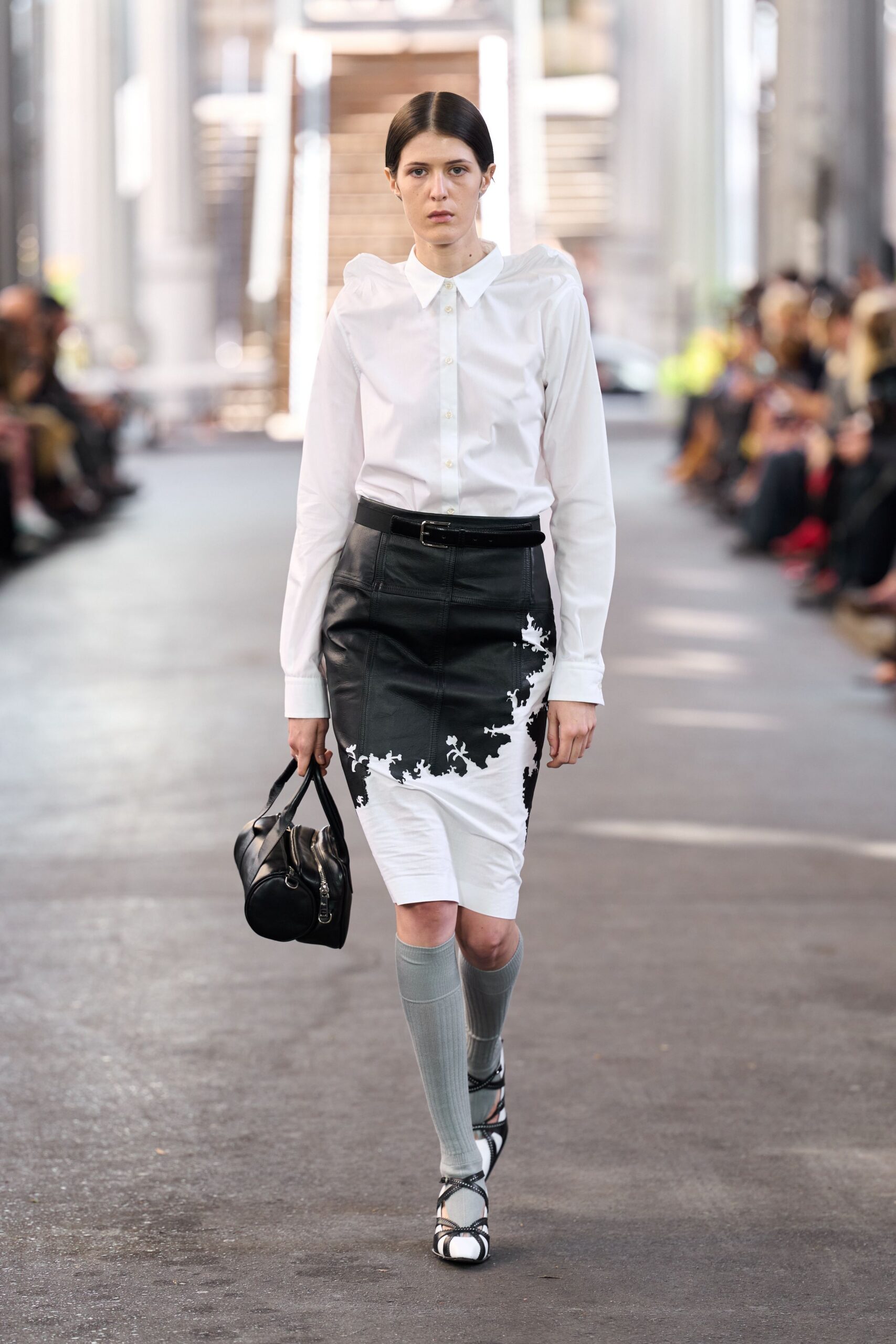 white shirt black leather skirt