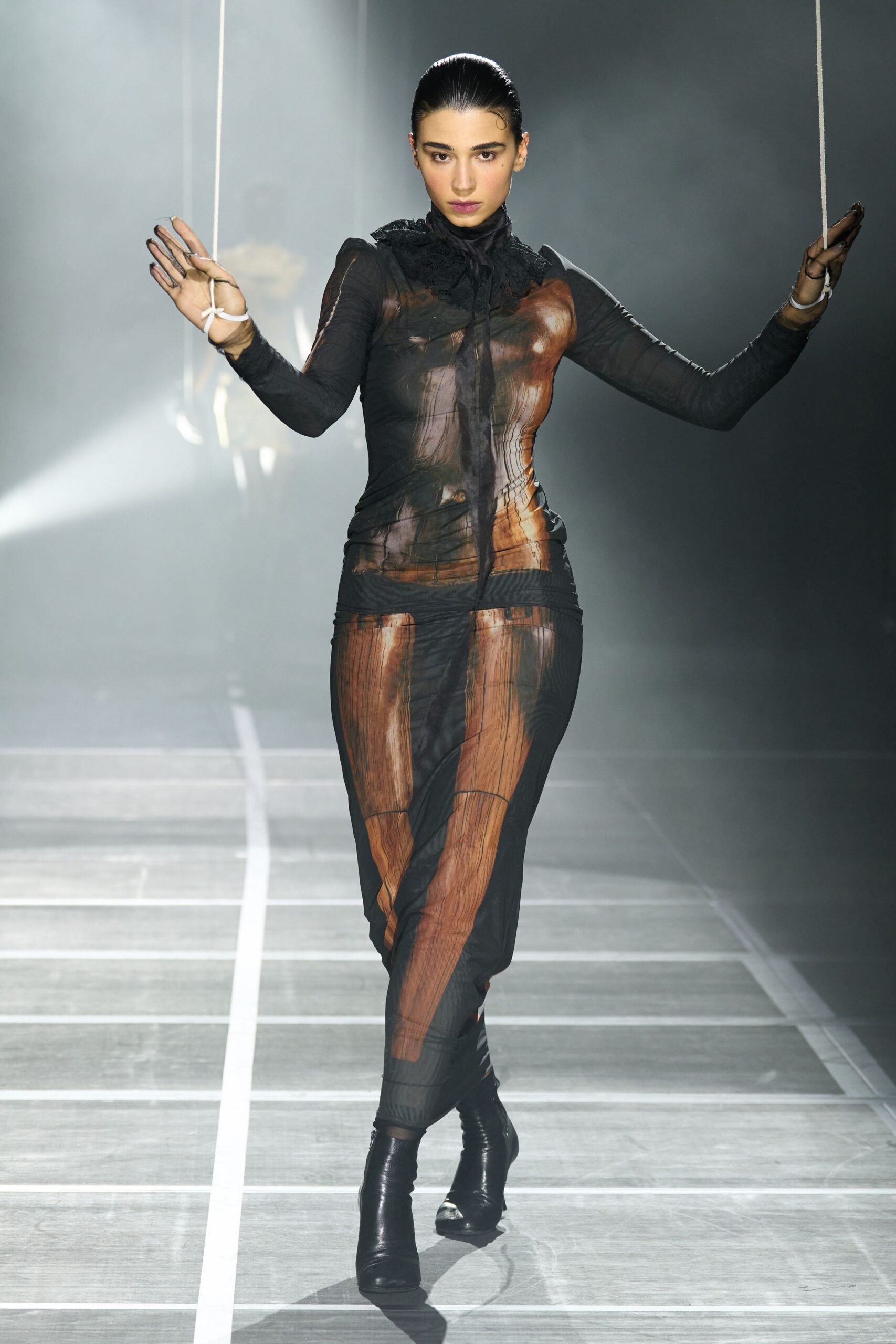 black fitted mesh dress with boots