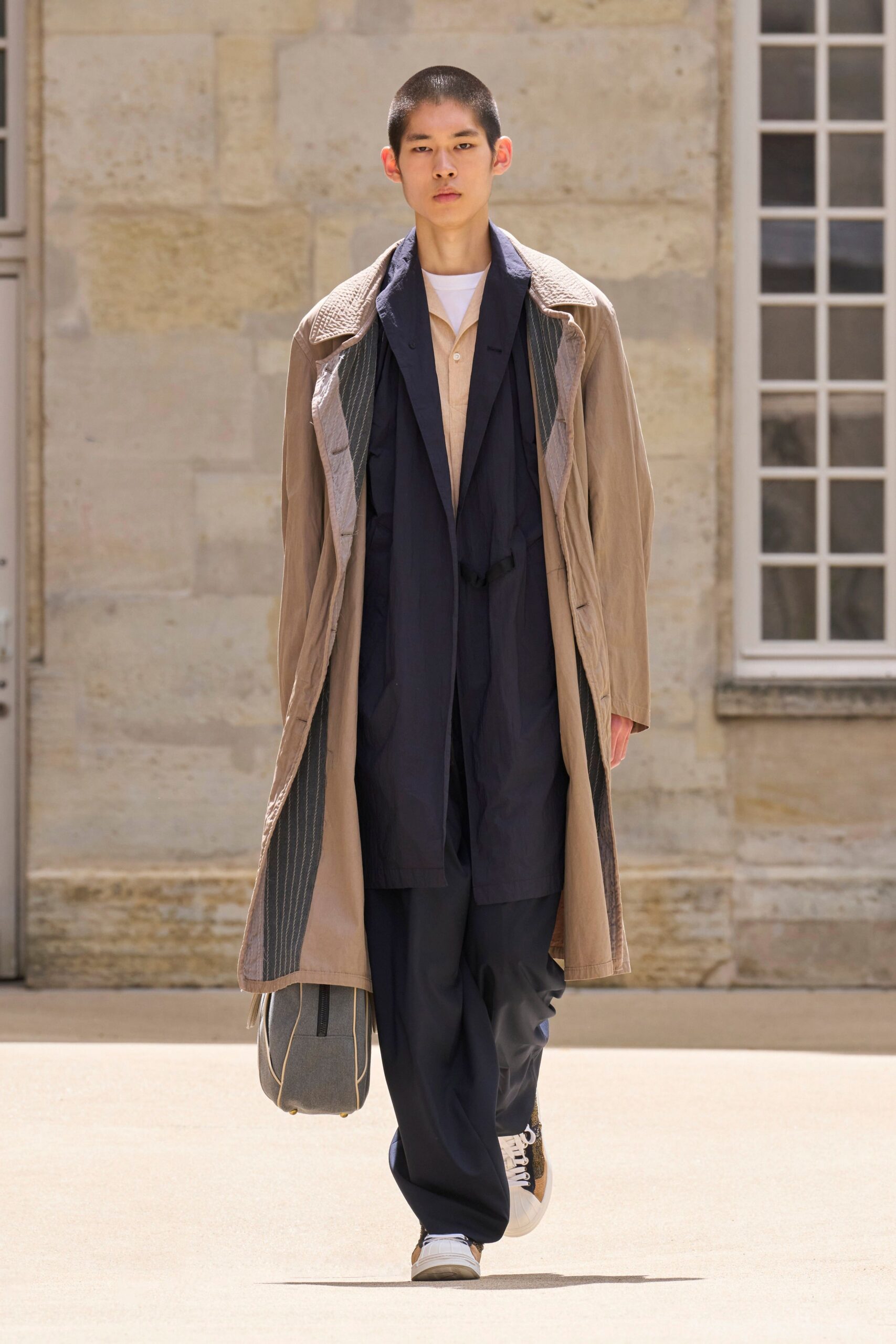 beige coat with navy pants