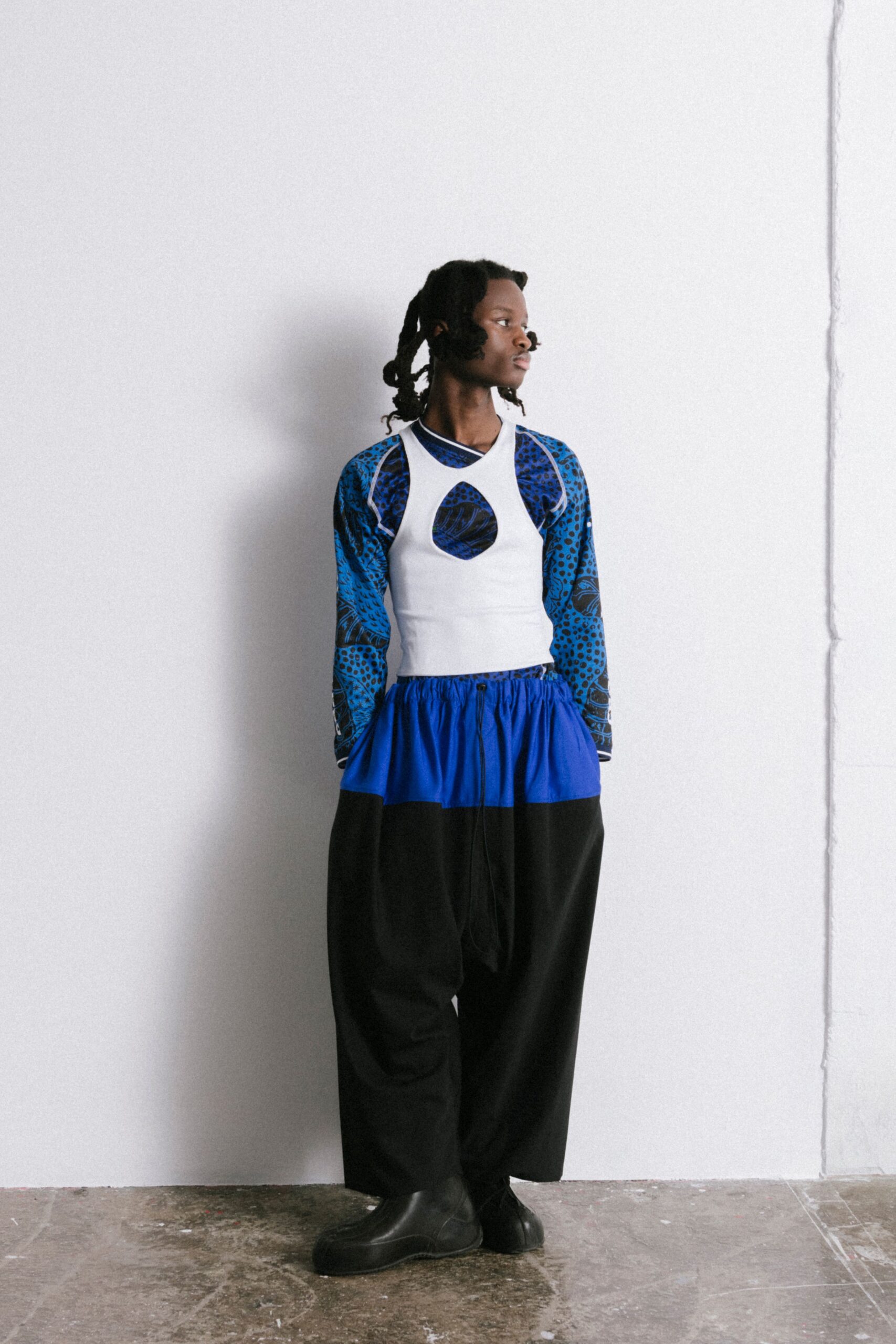 blue printed top black pants