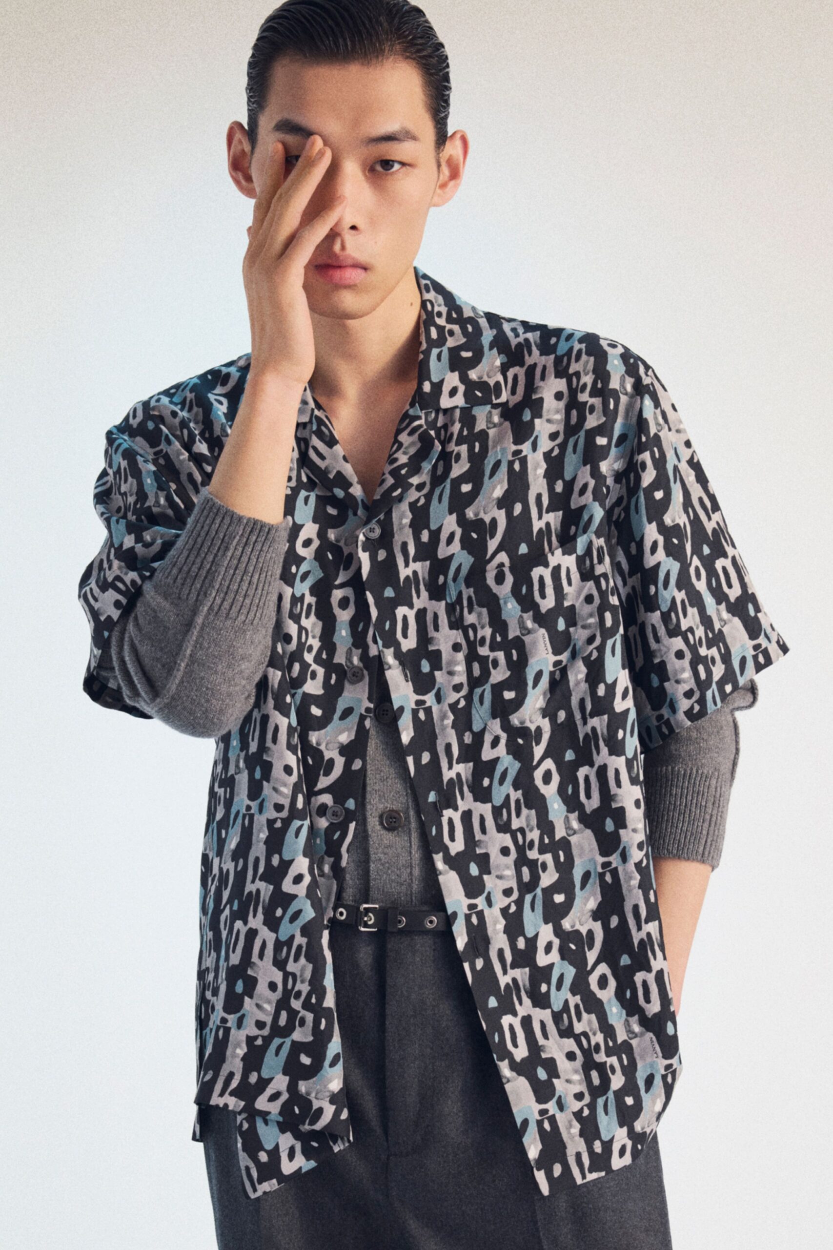 printed short-sleeve shirt with gray sweater