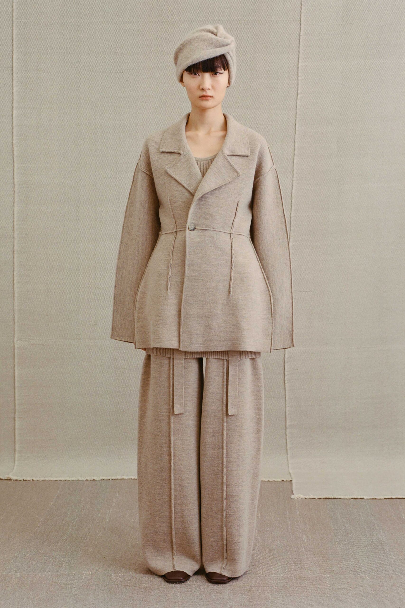 beige wool long-sleeve collared oversized buttoned layered jacket