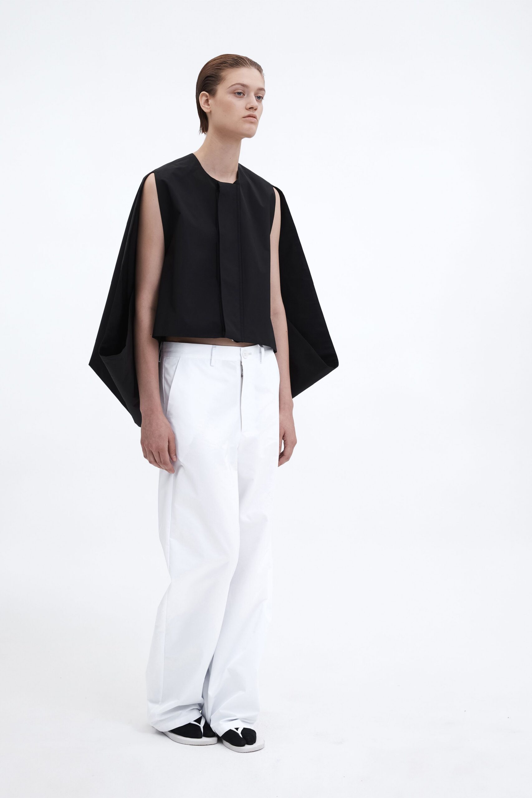 black top white pants outfit